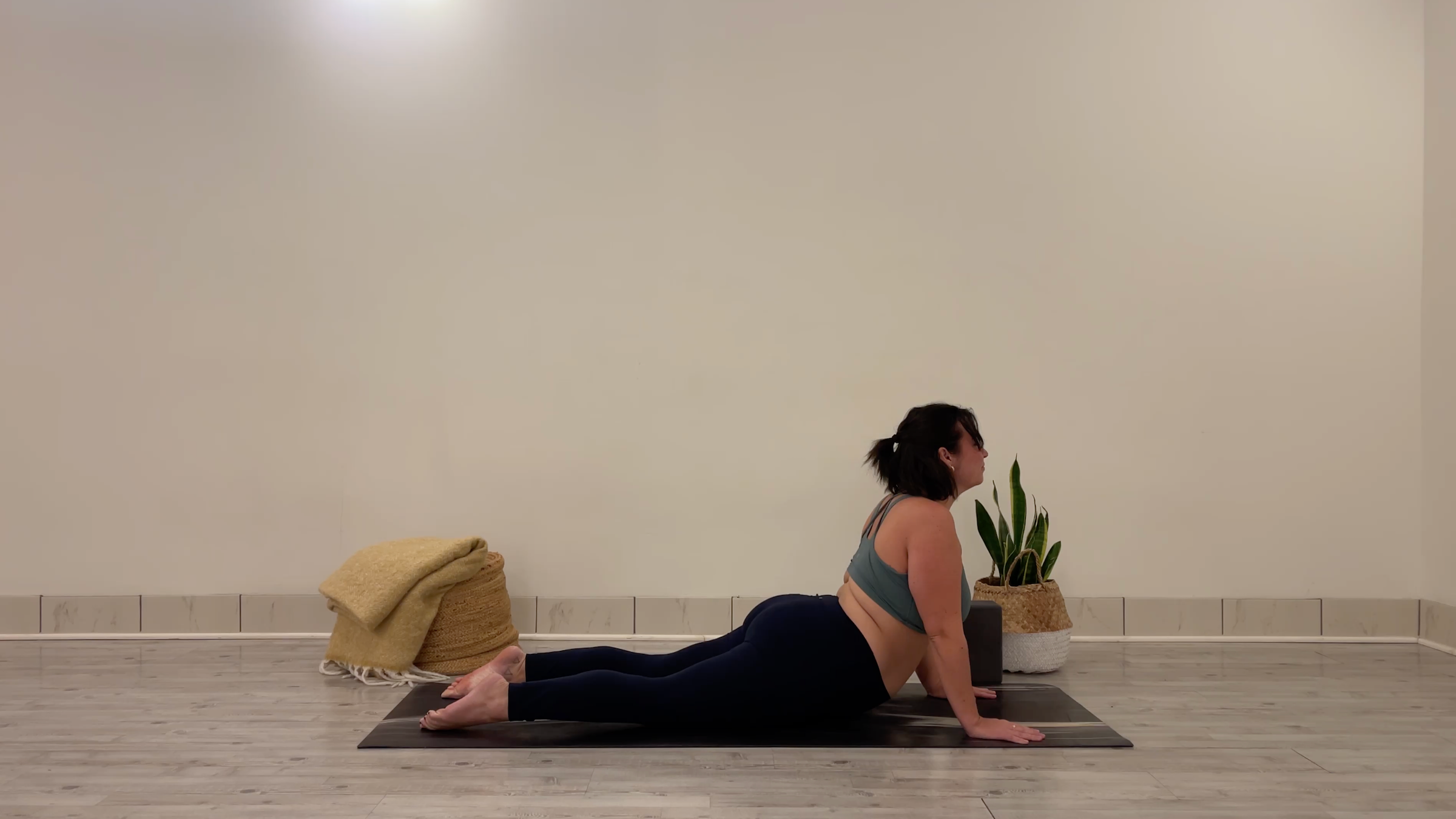 Teacher Taylor Lorenz in Cobra Pose