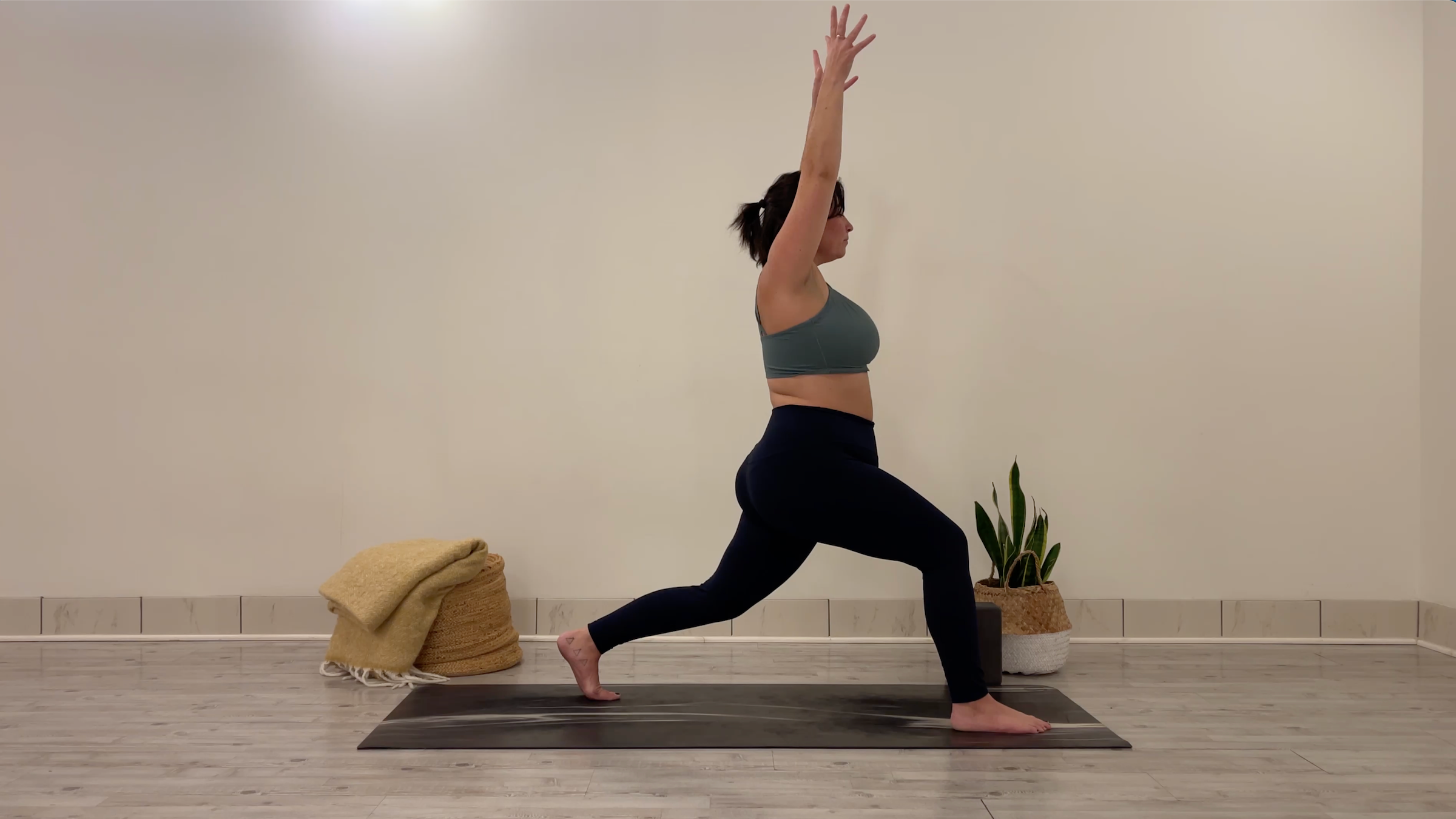 Teacher Taylor Lorenz in High Lunge