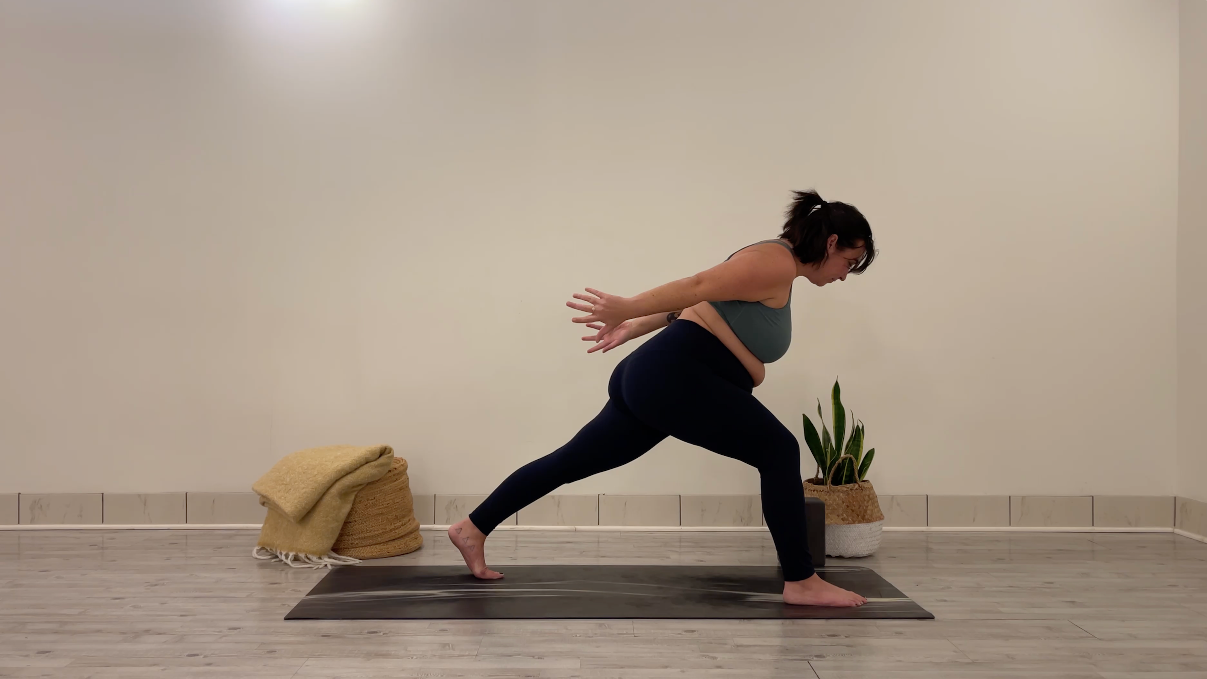 Teacher Taylor Lorenz in Runner's Lunge