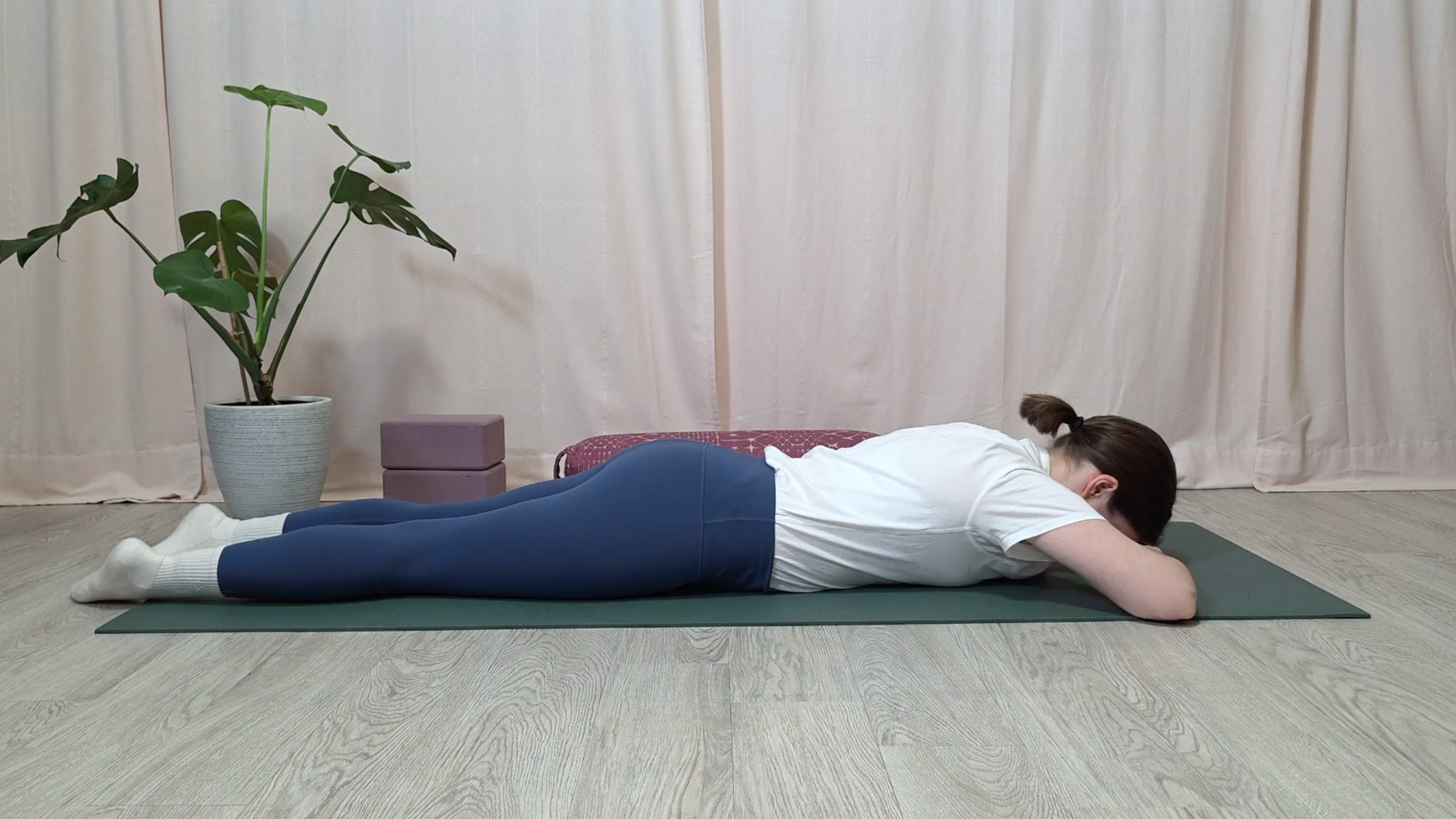 Teacher Katie McGrath in Crocodile Pose