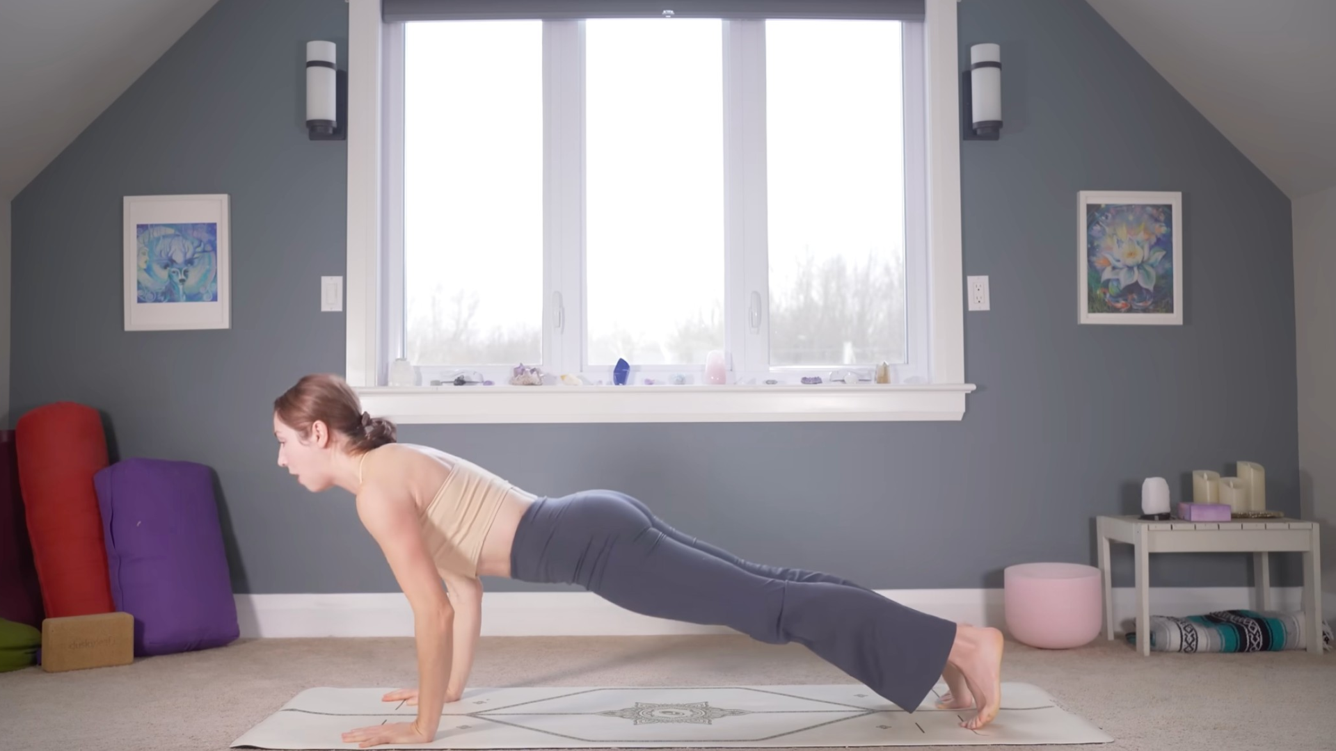 Woman in Plank Pose practicing yoga for strength