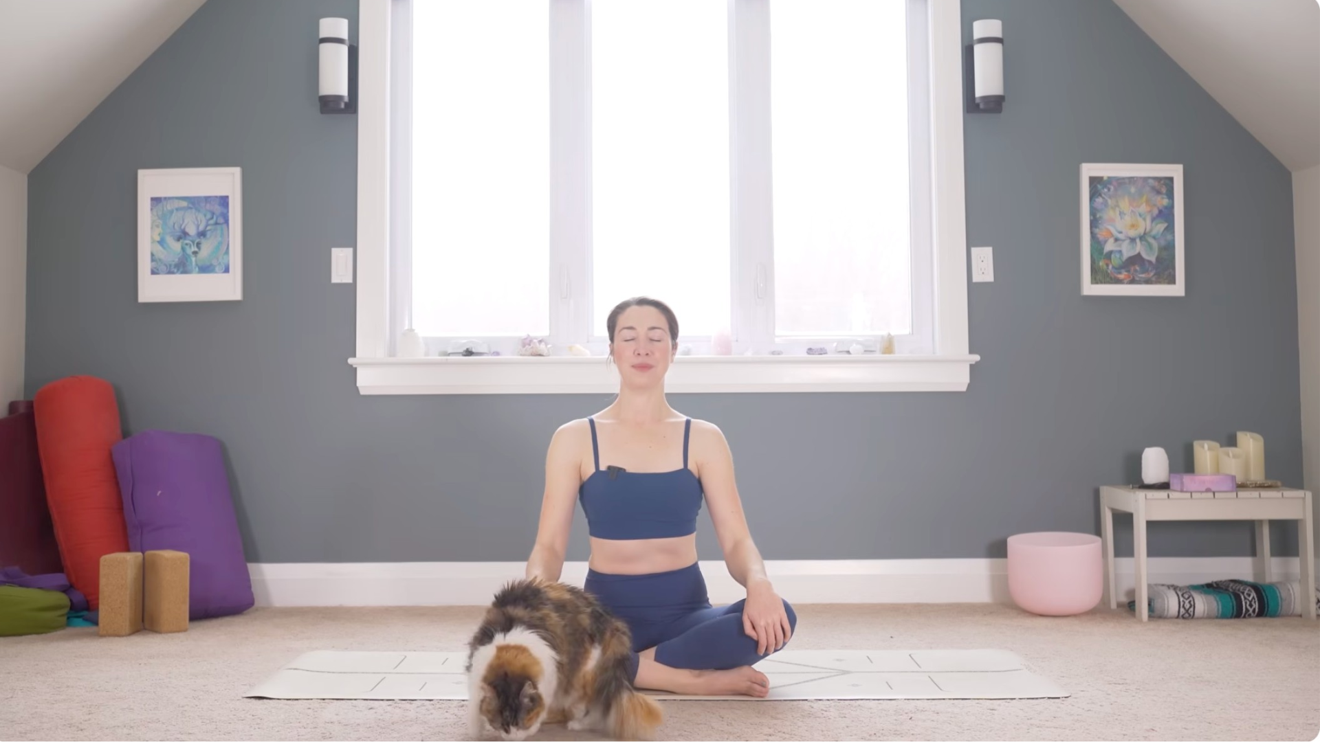 Woman sitting cross-legged on a mat