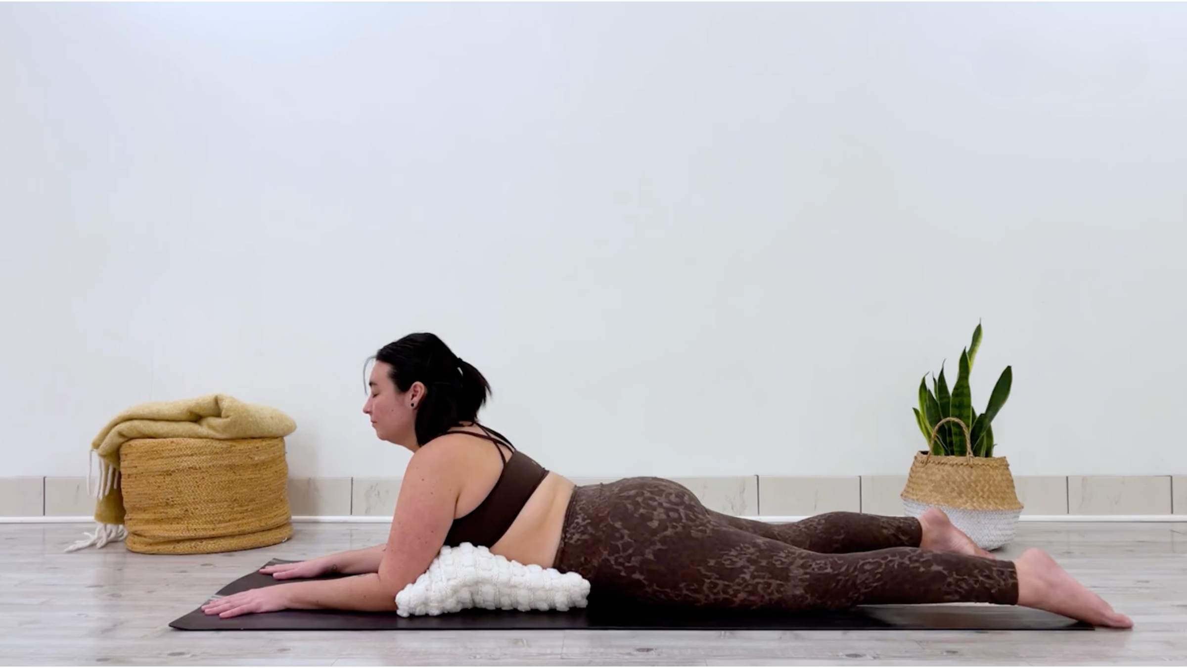 Teacher Taylor Lorenz in Sphinx Pose