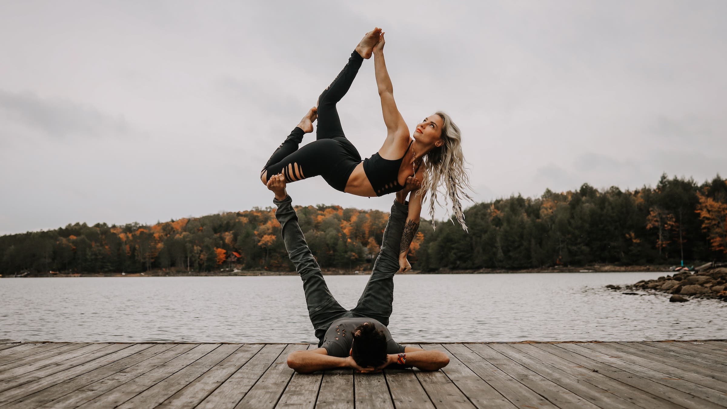 Miranda Leeann and Ryan Scott practicing couples yoga