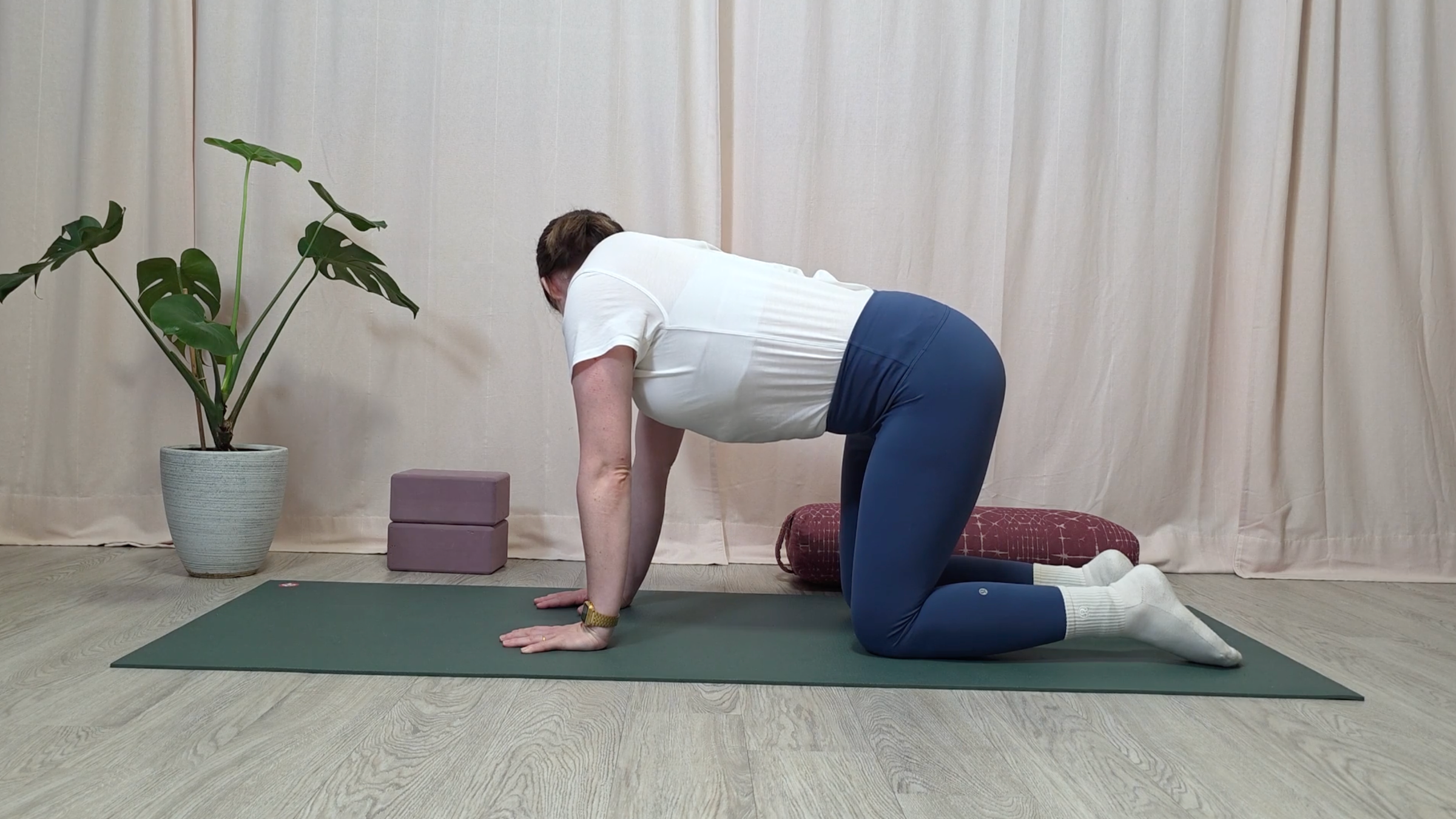 Teacher Katie McGrath doing a neck stretch