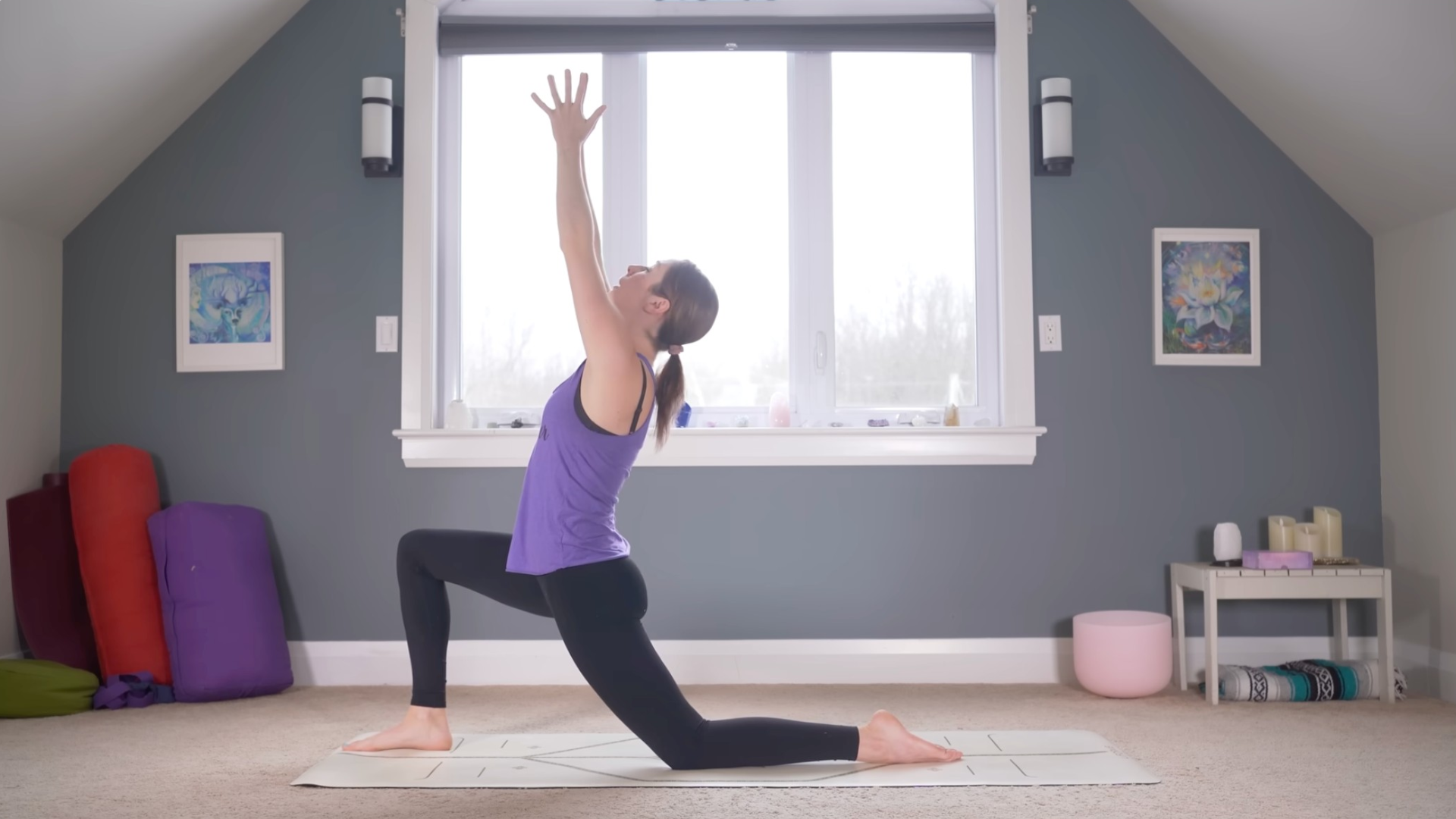 Woman kneeling in a low lunge during a 15-minute yoga for beginners practice