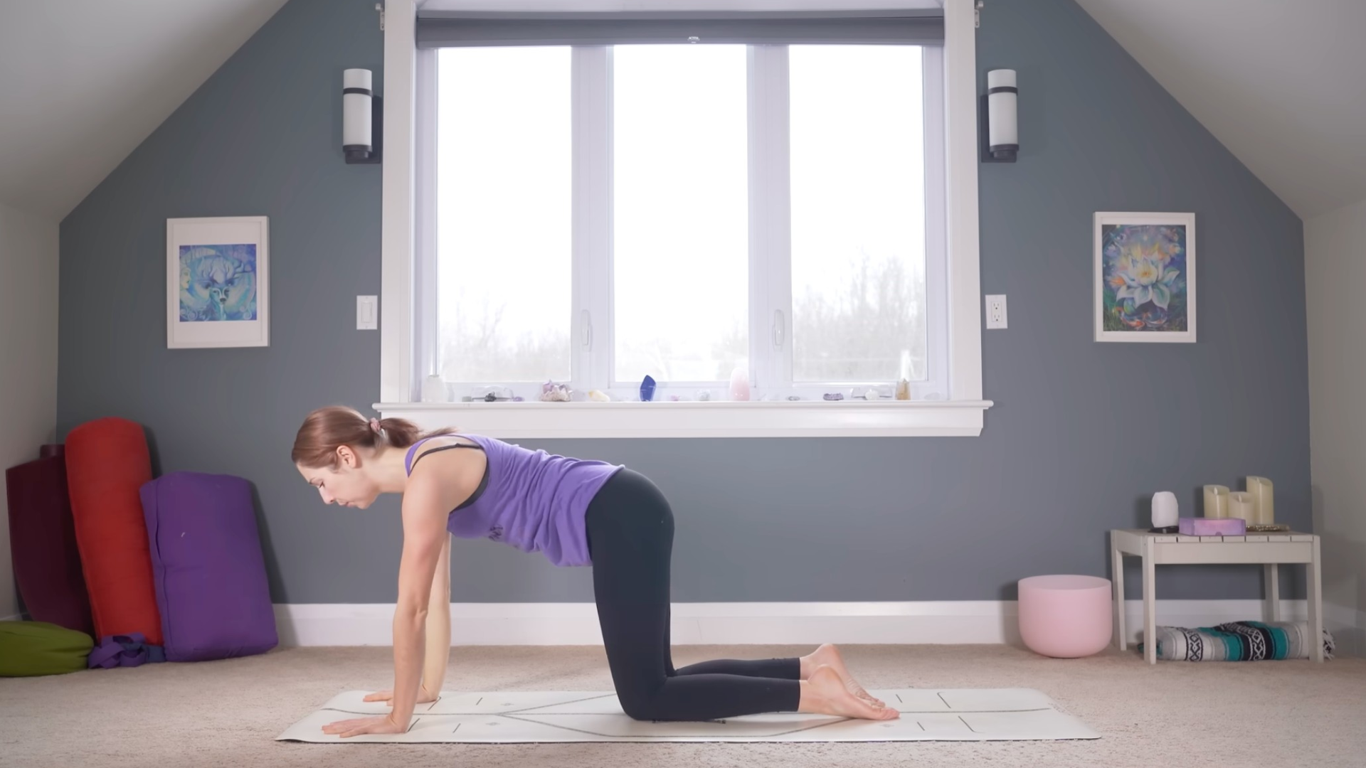 Woman kneeling on hands and knees
