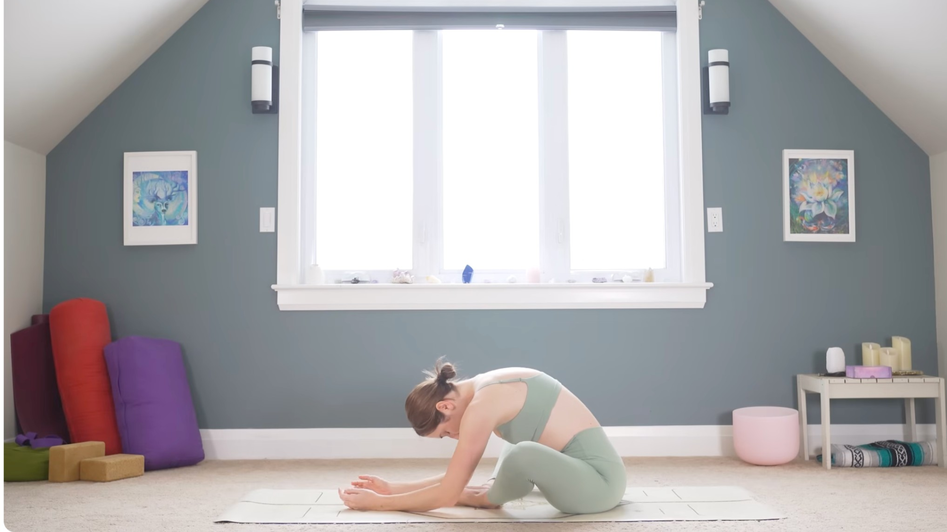 Woman sitting in Bound Angle Pose