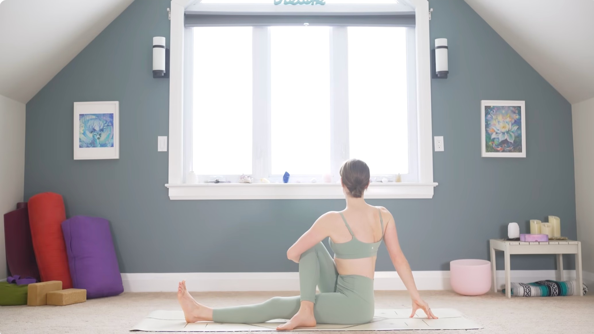 Woman sitting and twisting toward the right