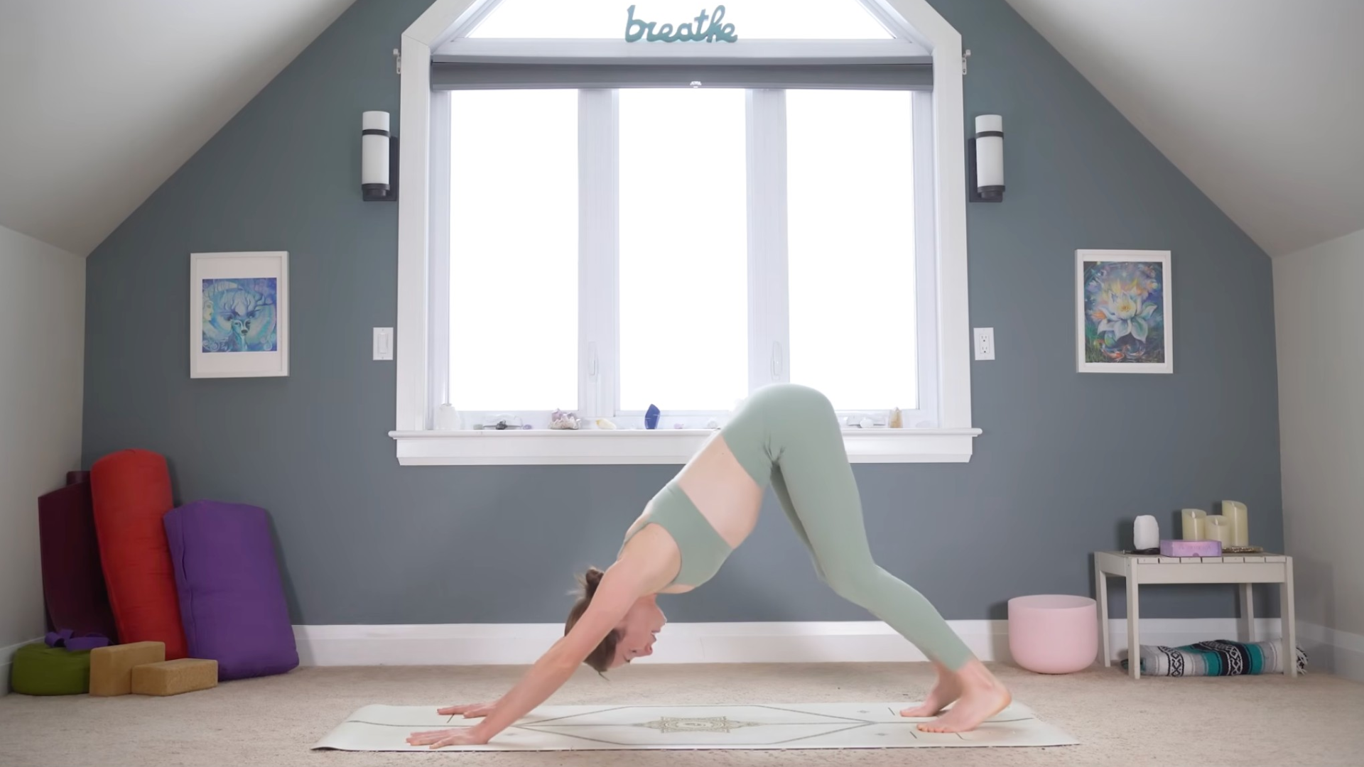 Woman in Downward-Facing Dog during a 10-minute morning yoga routine