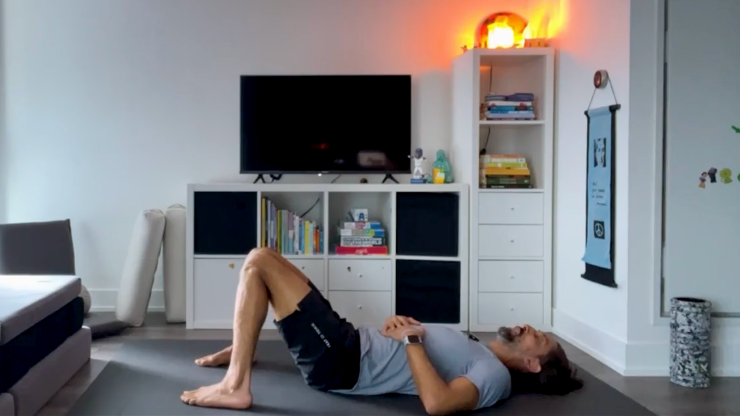 Yoga teacher Jaffer Hussain in Constructive Rest, part of his yoga for core strength practice