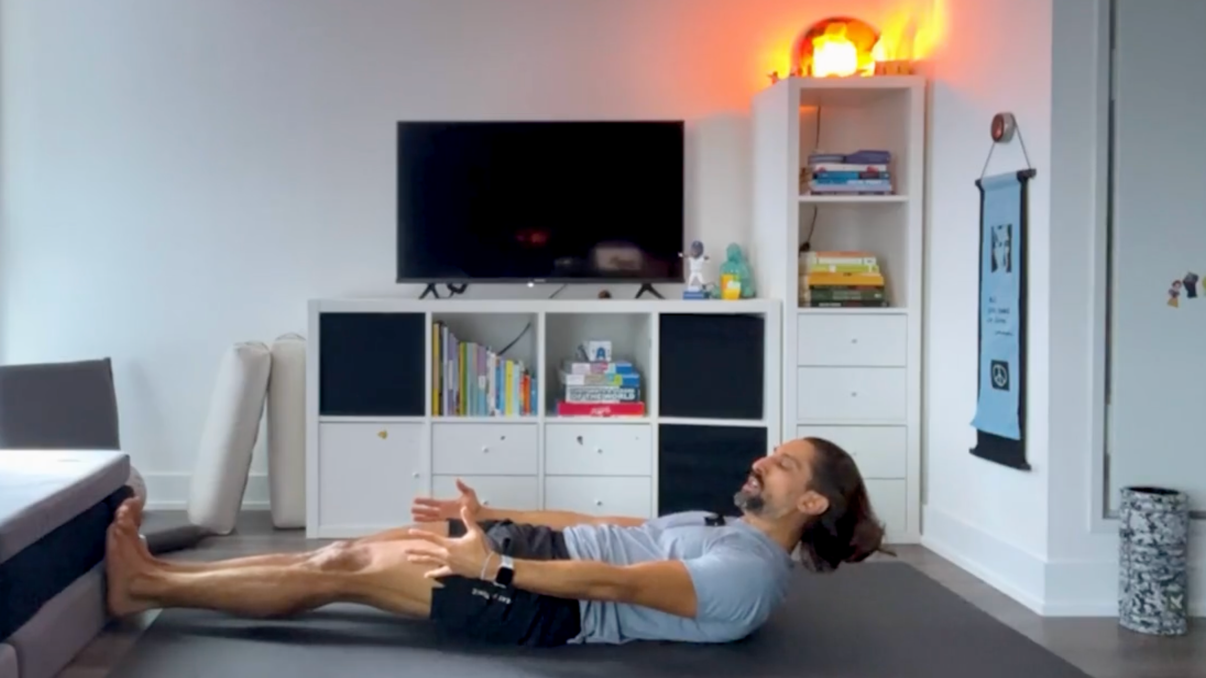 Yoga teacher Jaffer Hussain in Dynamic Boat Pose, part of his yoga for core strength practice