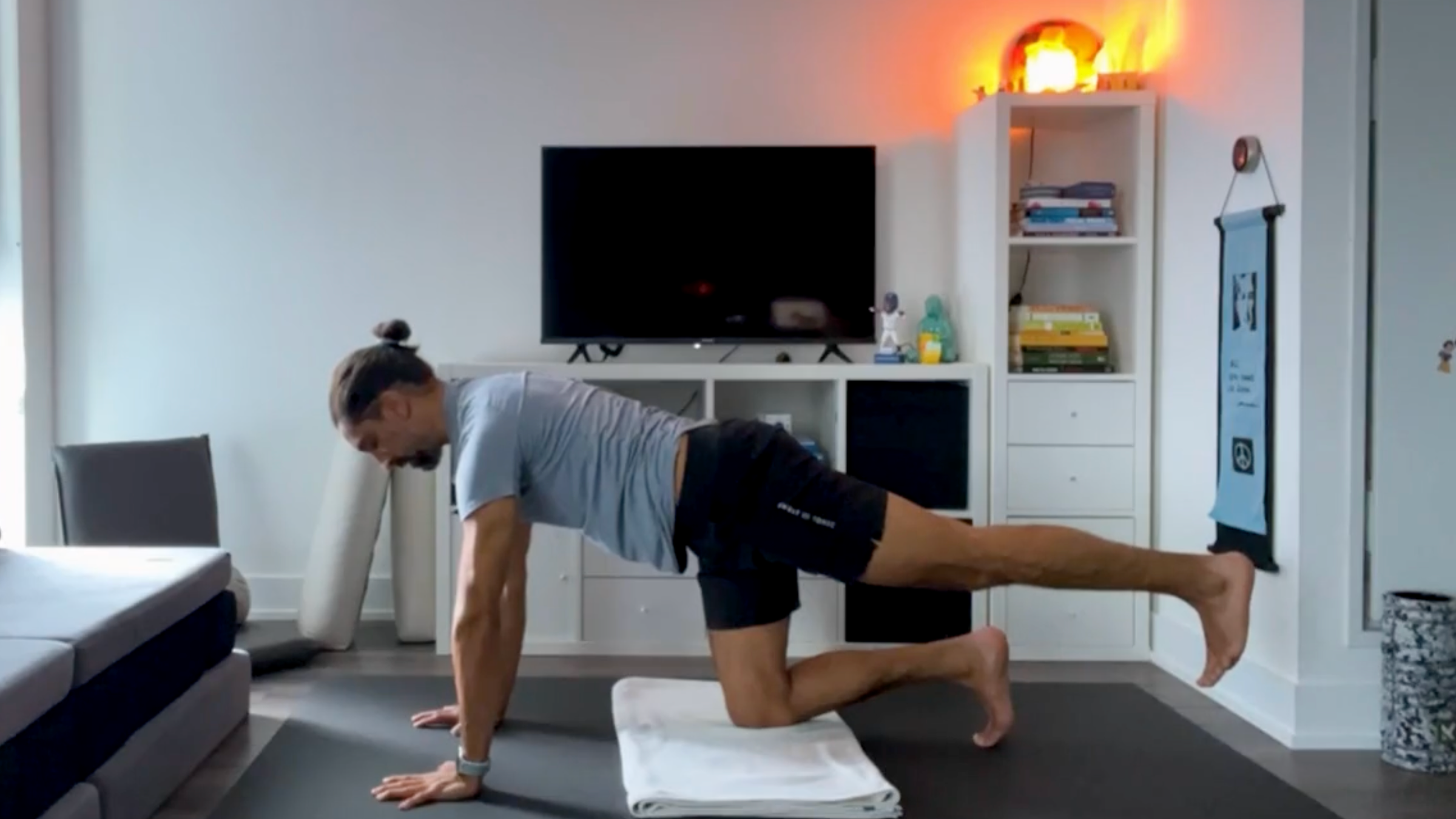 Yoga teacher Jaffer Hussain in Three-Legged Dog, part of his yoga for core strength practice