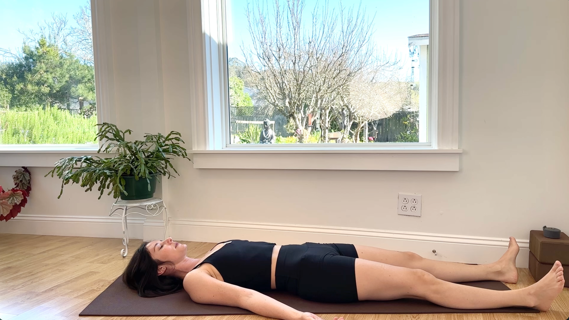 Yoga teacher Michelle Martone in Savasana