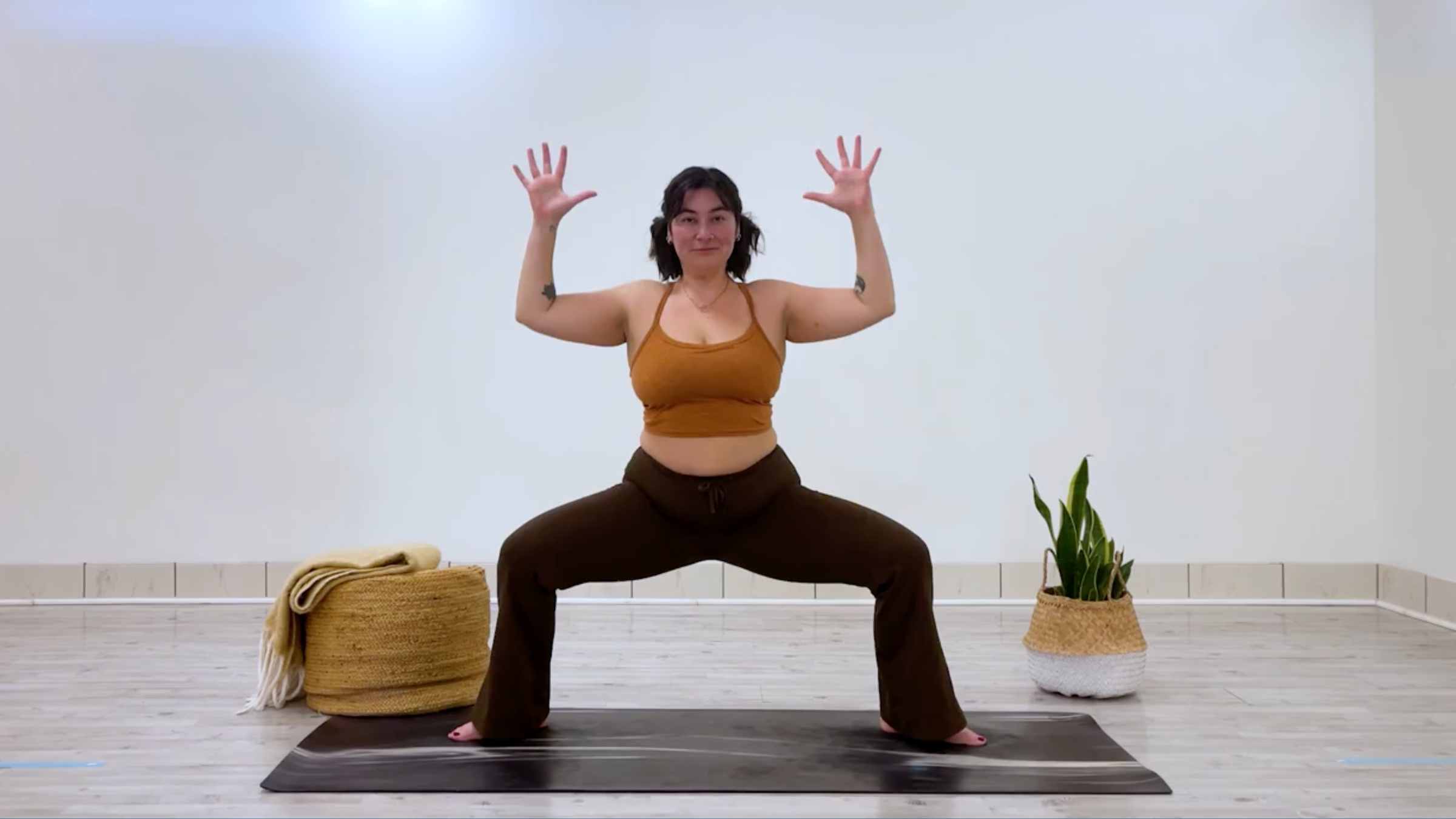 Yoga teacher Taylor Lorenz in Goddess Pose, part of her good mood yoga practice