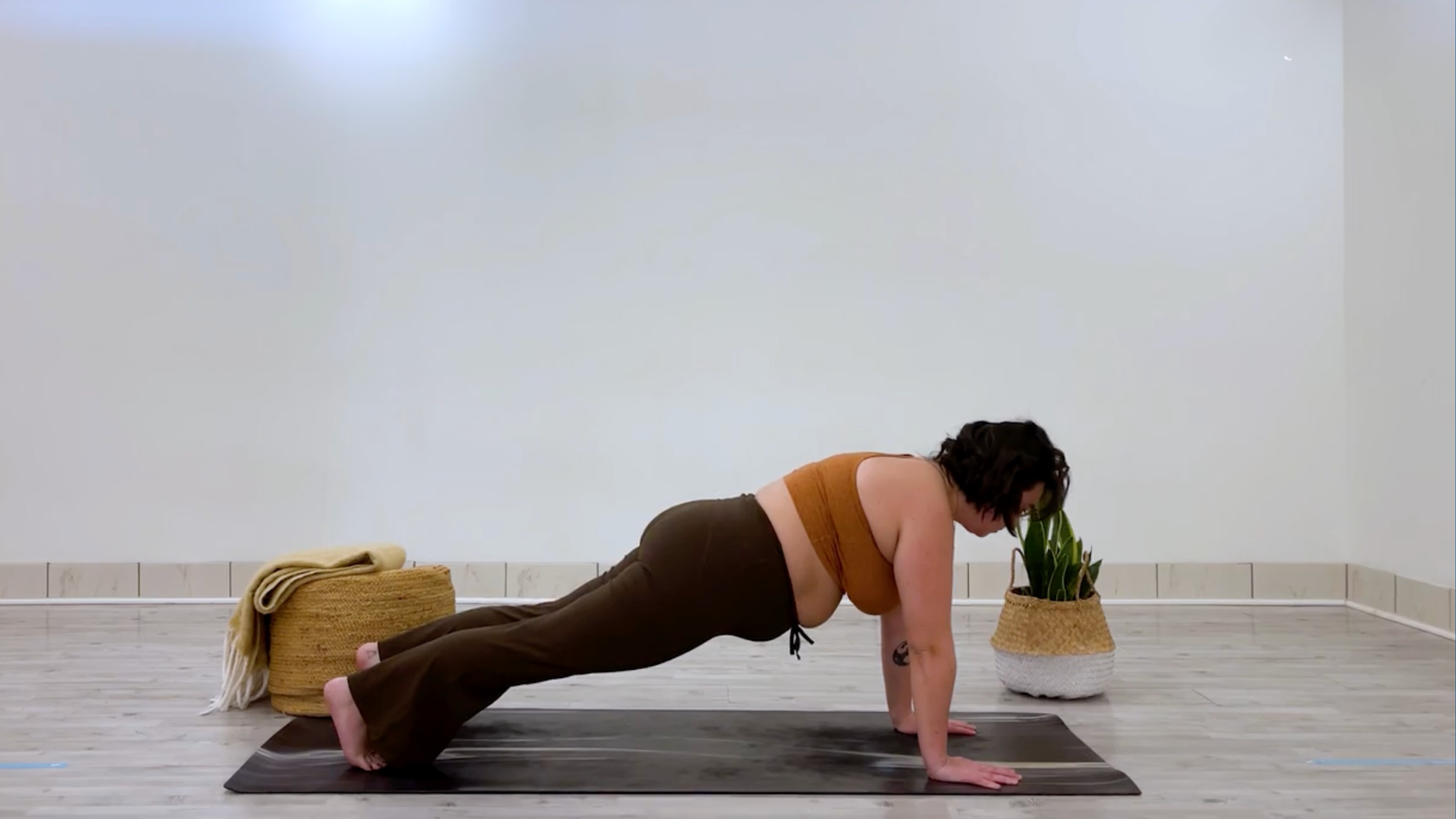 Teacher Taylor Lorenz in Plank Pose