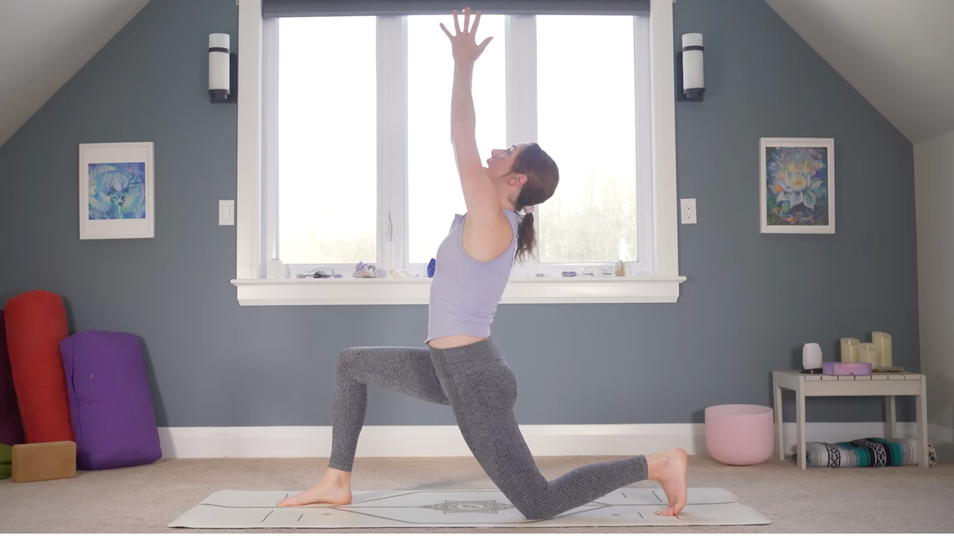 Woman kneeling on a mat in Low Lunge