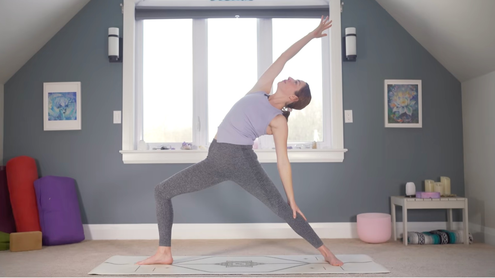 Woman standing in Reverse Warrior Pose