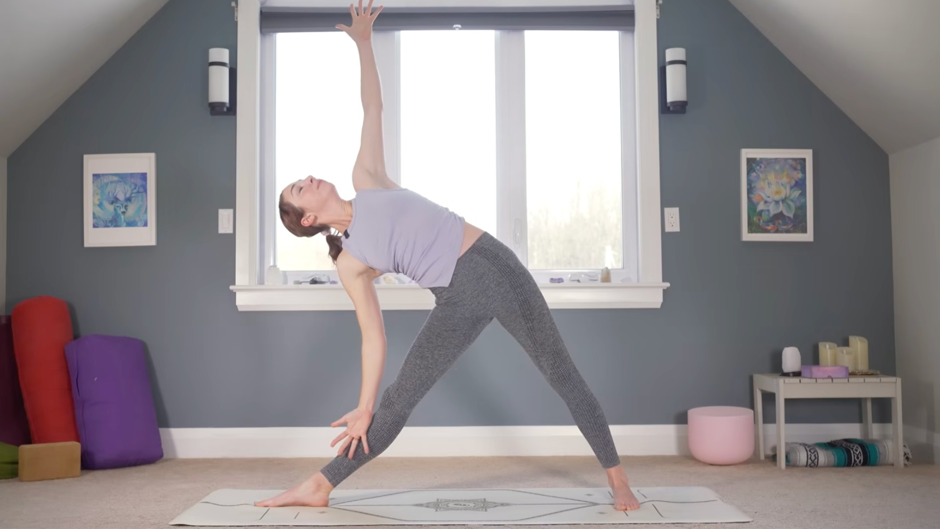 Woman practicing slow yoga for flexibility during Triangle Pose