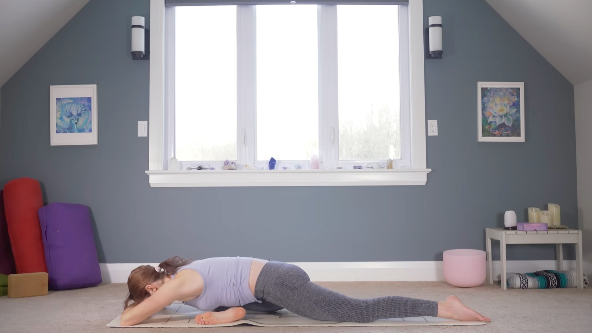 Woman leaning forward in Sleeping Pigeon Pose
