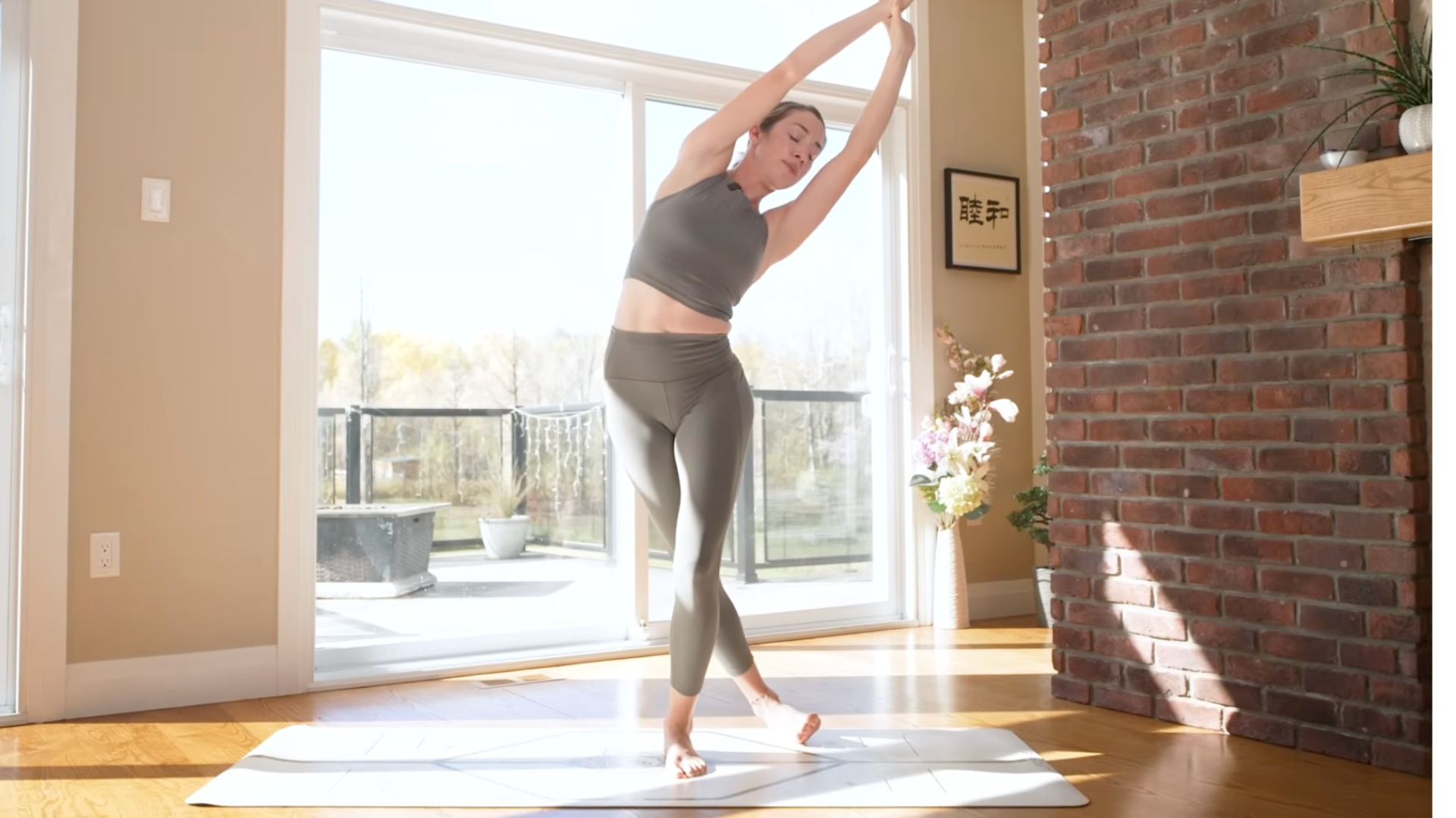 Woman with one foot stepped behind and to the side as she leans her upper body toward that same side in a stretch