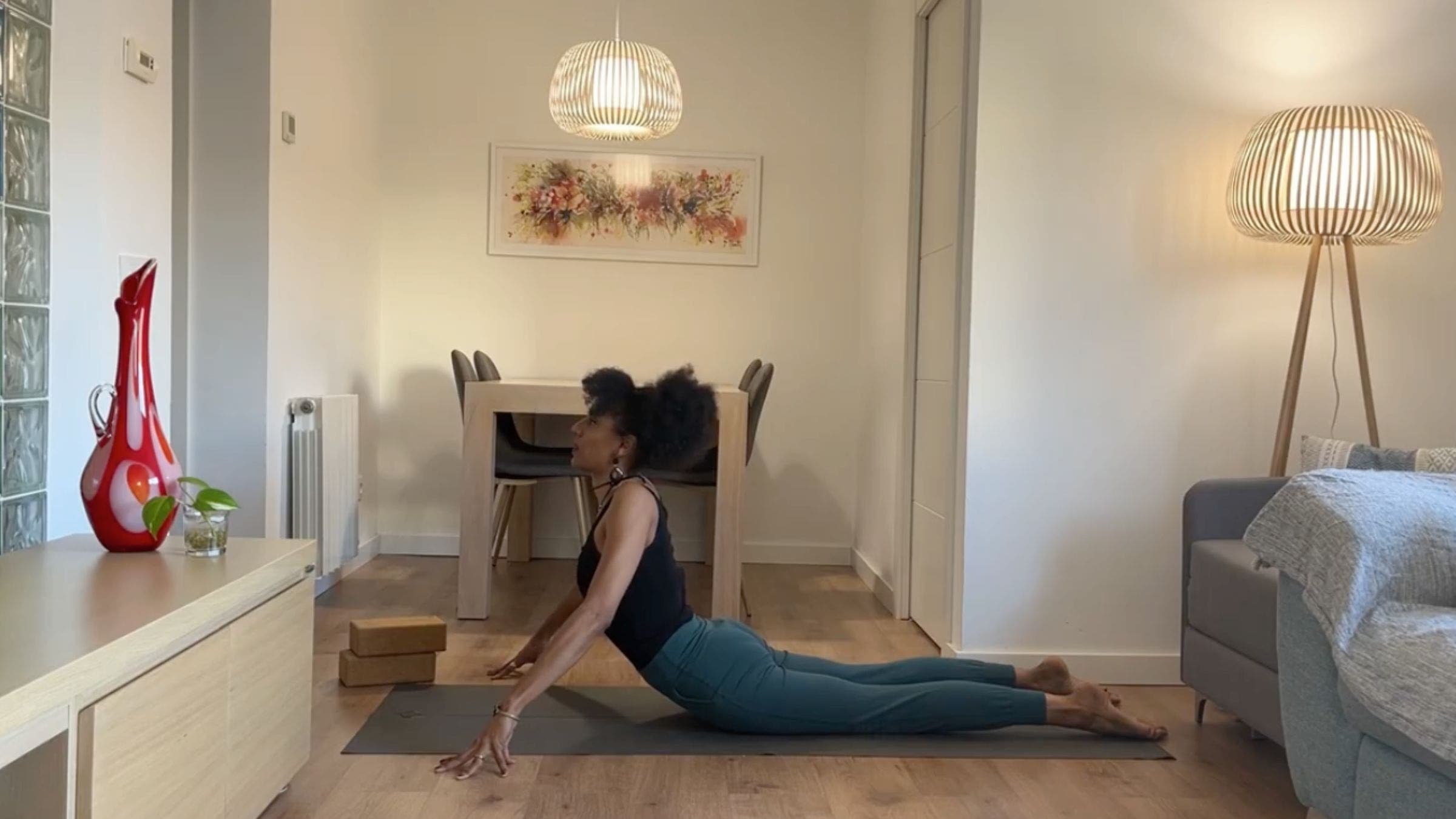 Yoga instructor practicing Upward Dog.