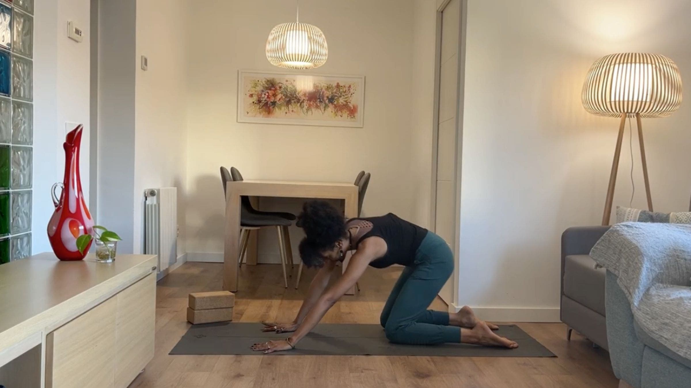 Yoga instructor practicing tabletop circles.