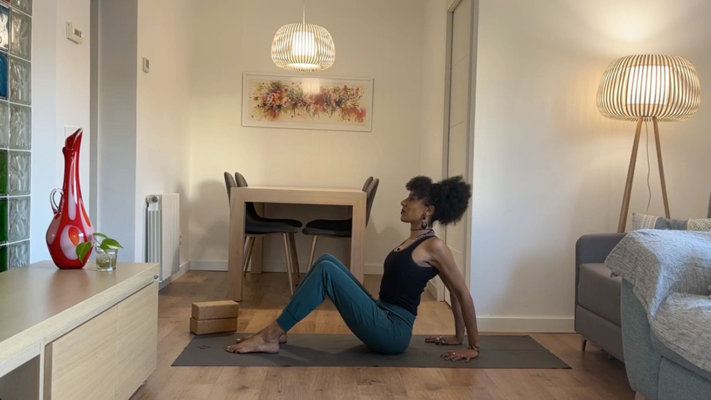Yoga instructor practicing Seated backbend.
