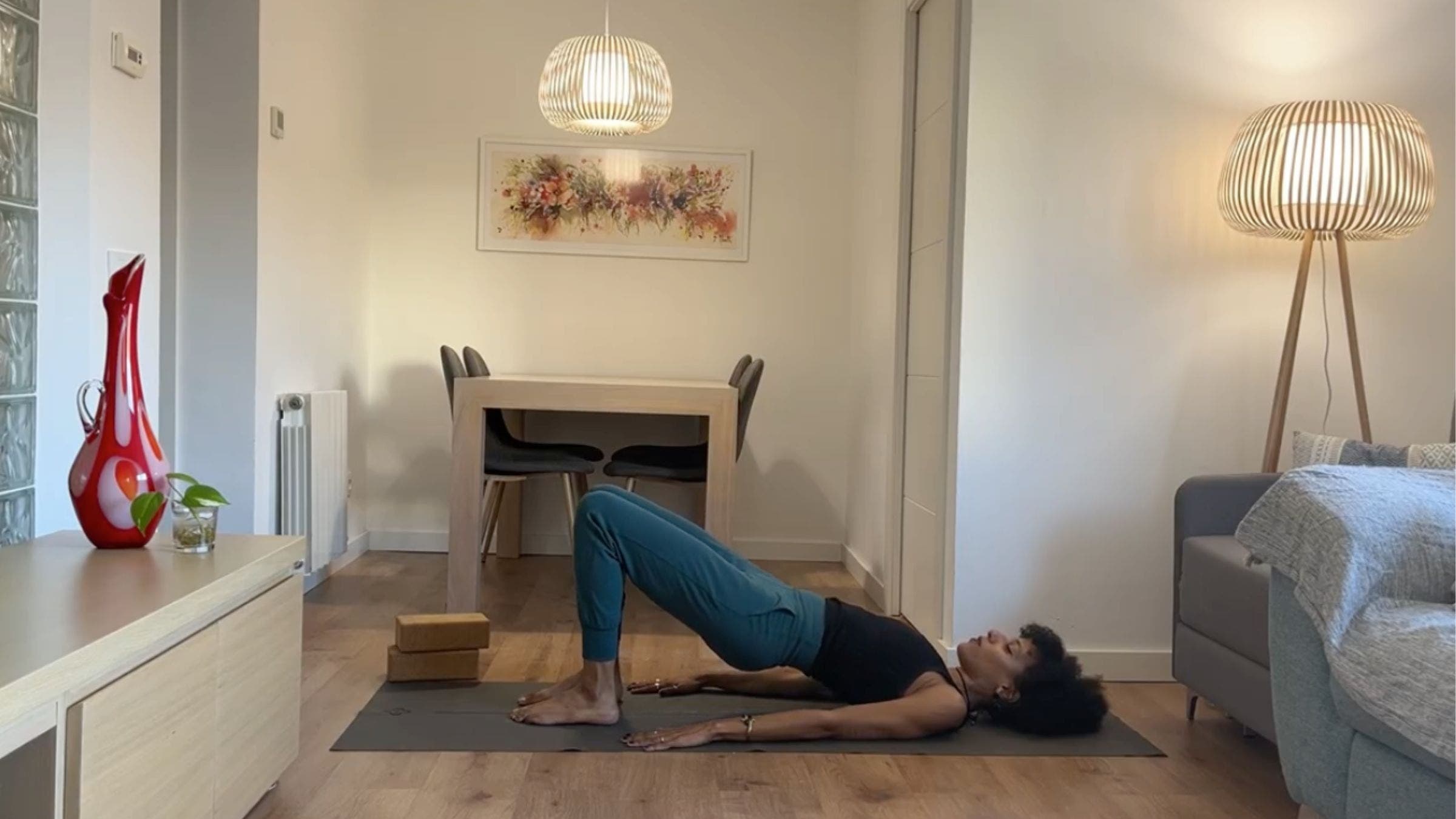 Yoga instructor practicing Bridge Pose.