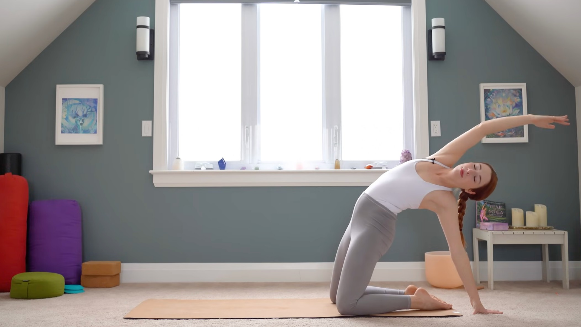 Woman kneeling in Camel Pose