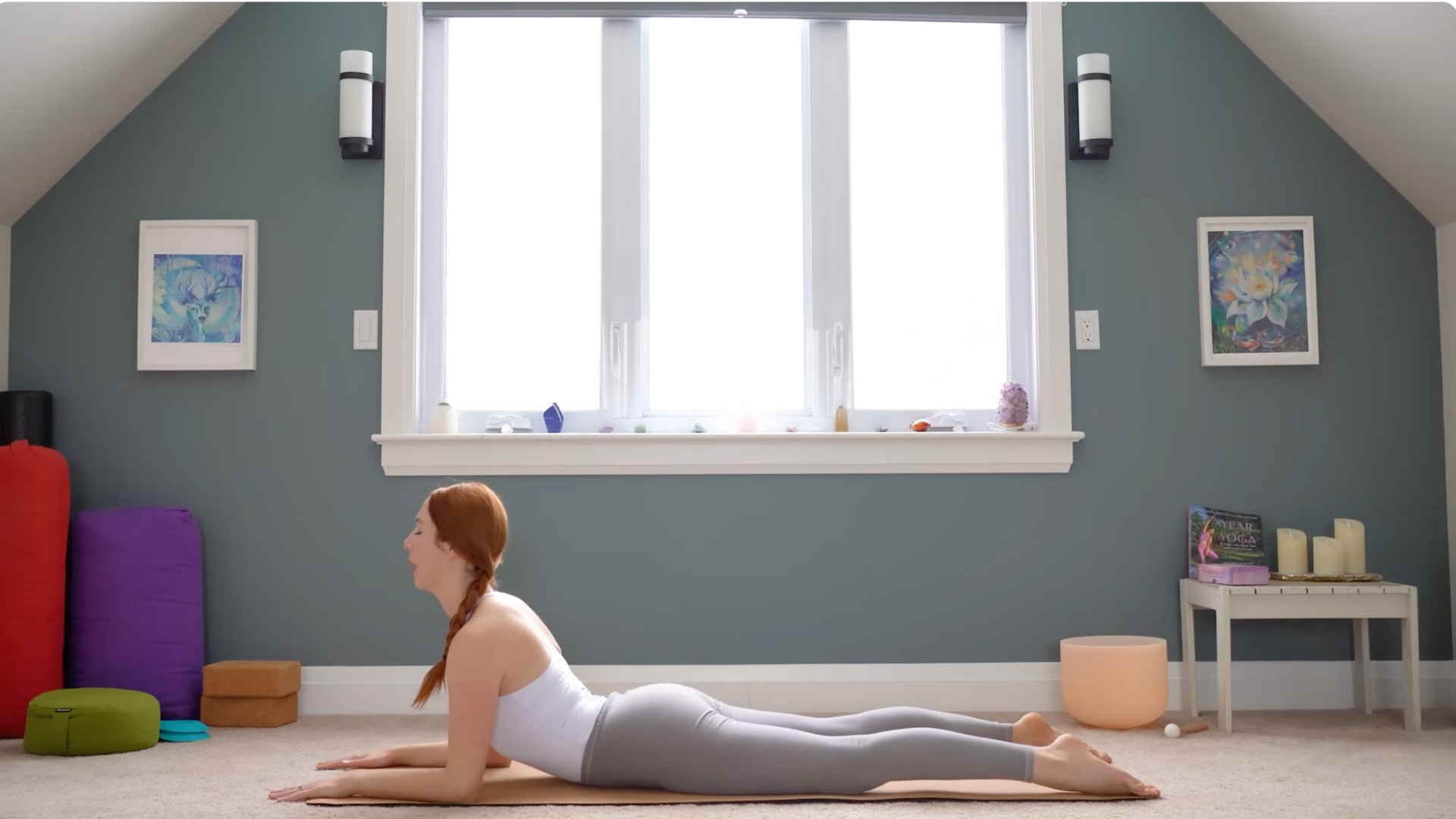 Woman lying on her belly in Sphinx Pose