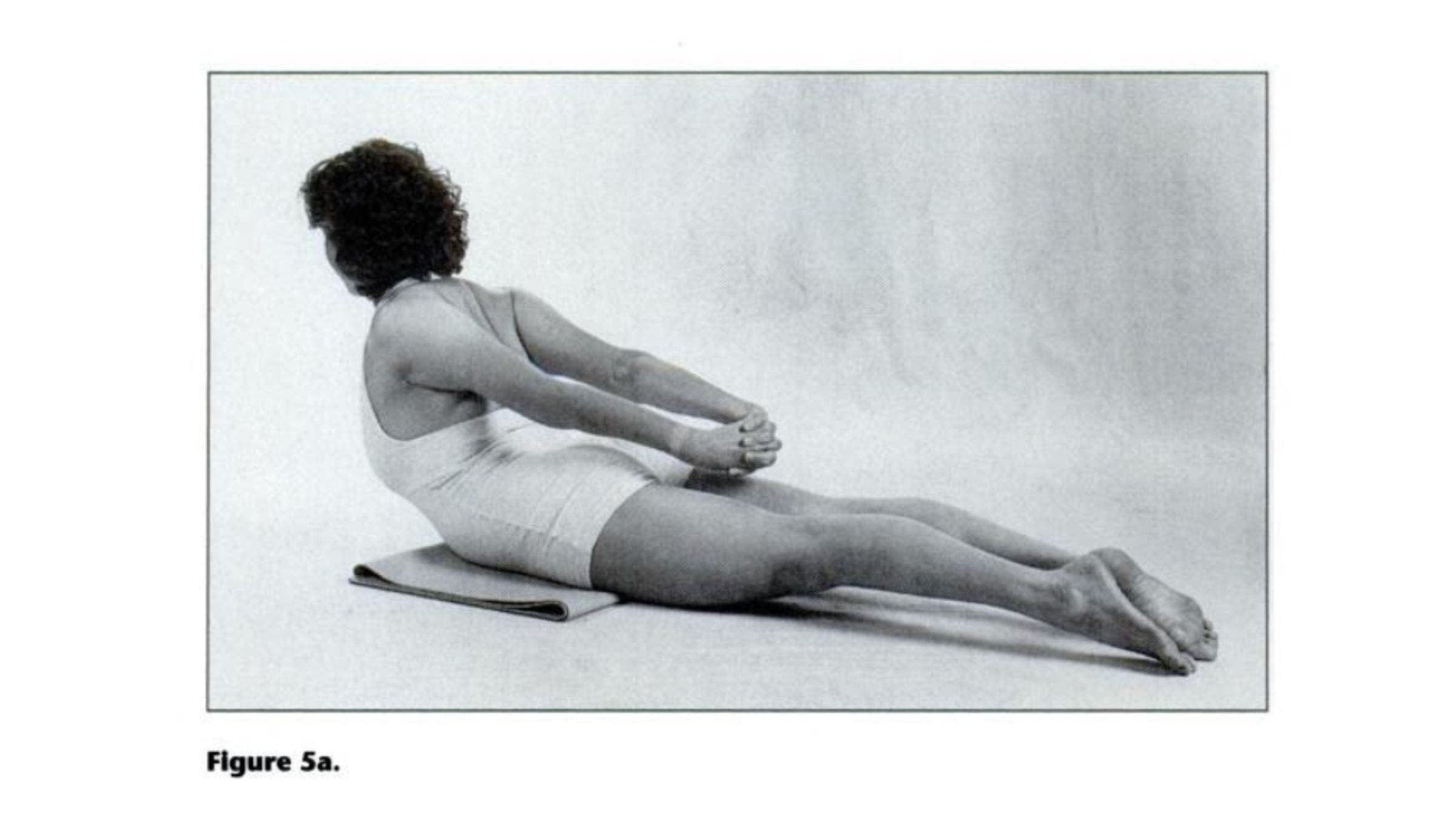 Woman practicing backbend for tight shoulders.
