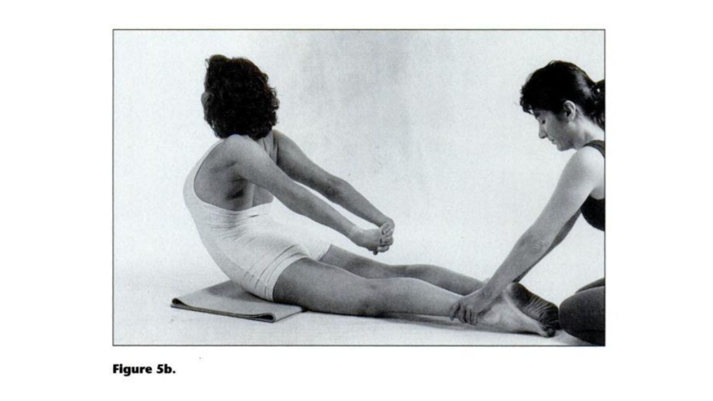 Woman practicing backbend for tight shoulders.