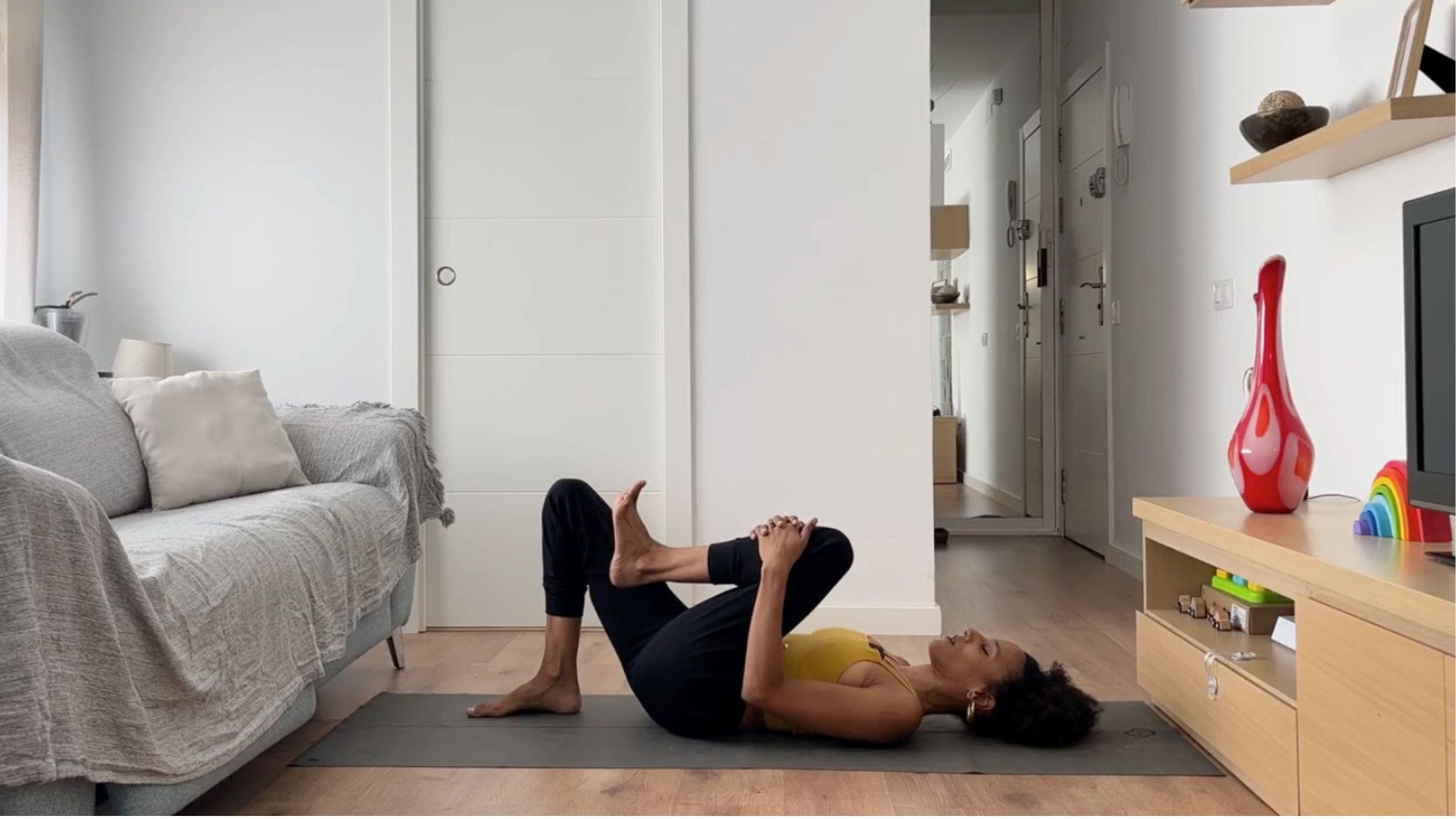 Woman practicing ankle circles.