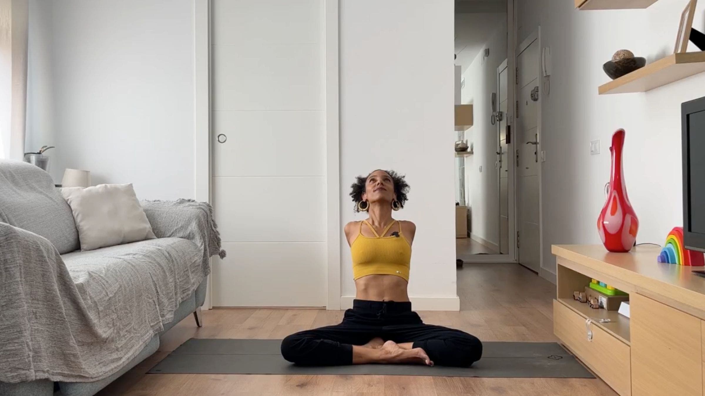 Woman practicing Seated backbend.