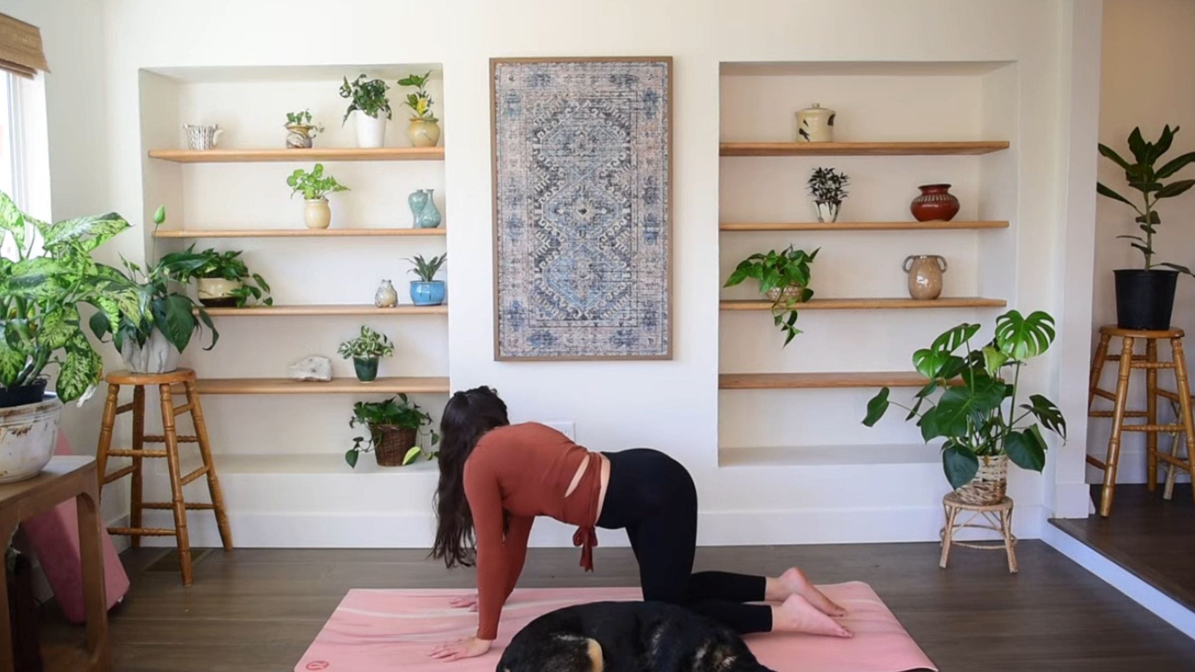 Yoga instructor Caitlin K'eli practicing side bends.