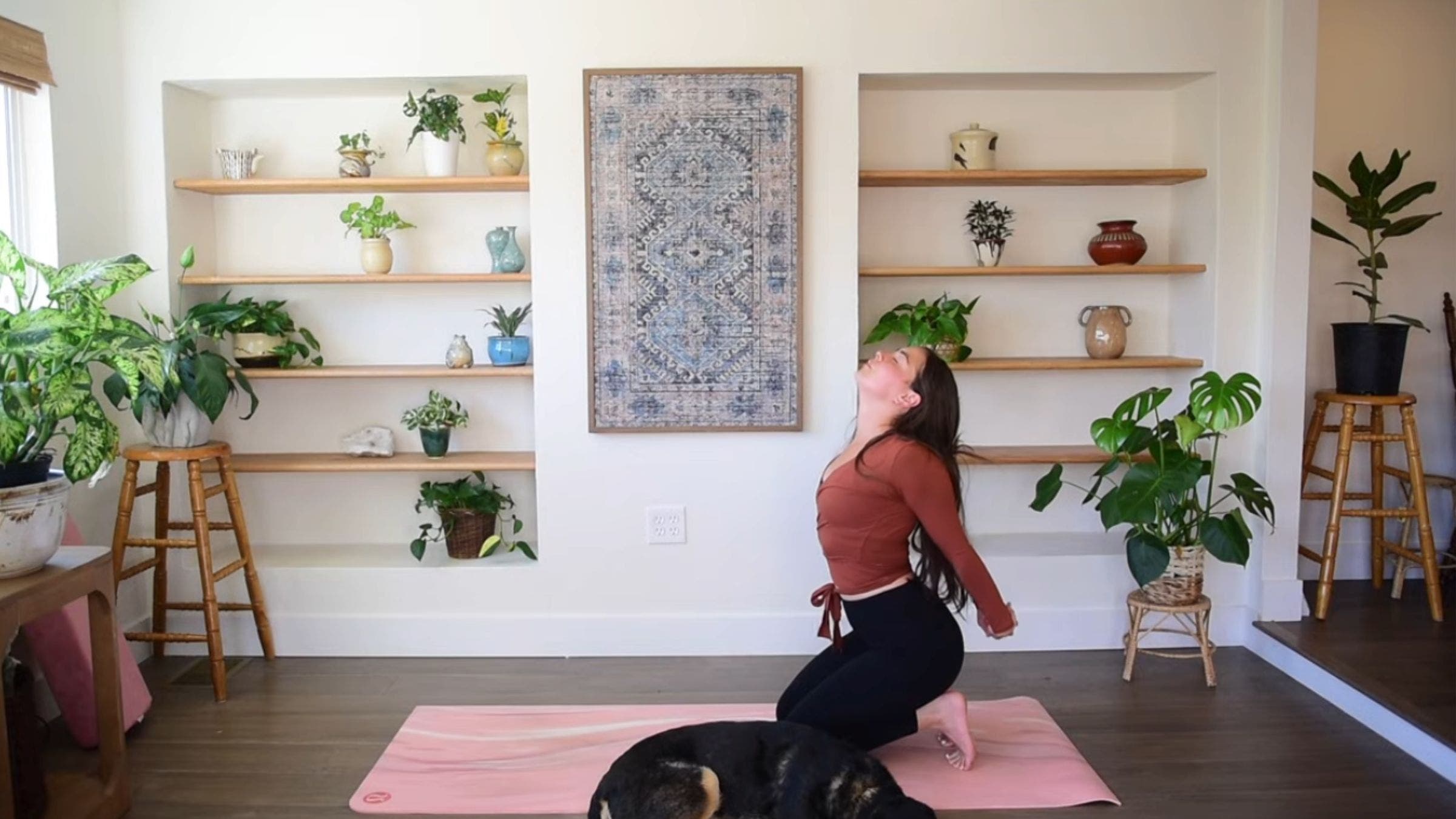 Yoga instructor Caitlin K'eli practicing Toe Squat.