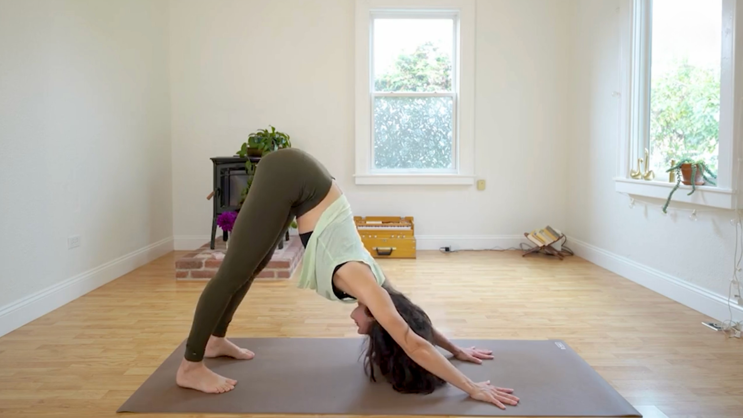 Teacher Michelle Martone in Downward-Facing Dog