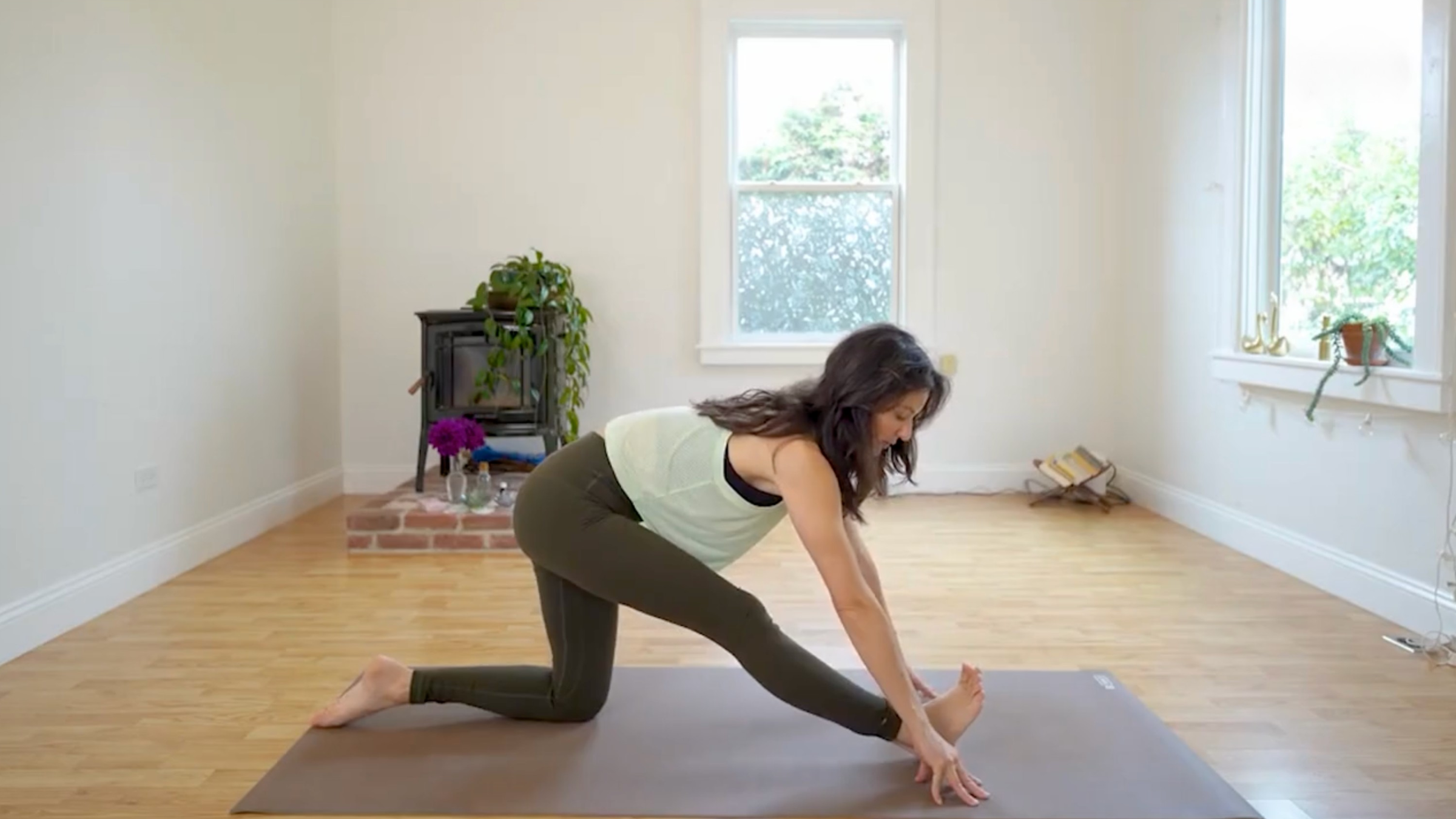 Yoga teacher Michelle Martone in Half Splits, one of a series of hip openers
