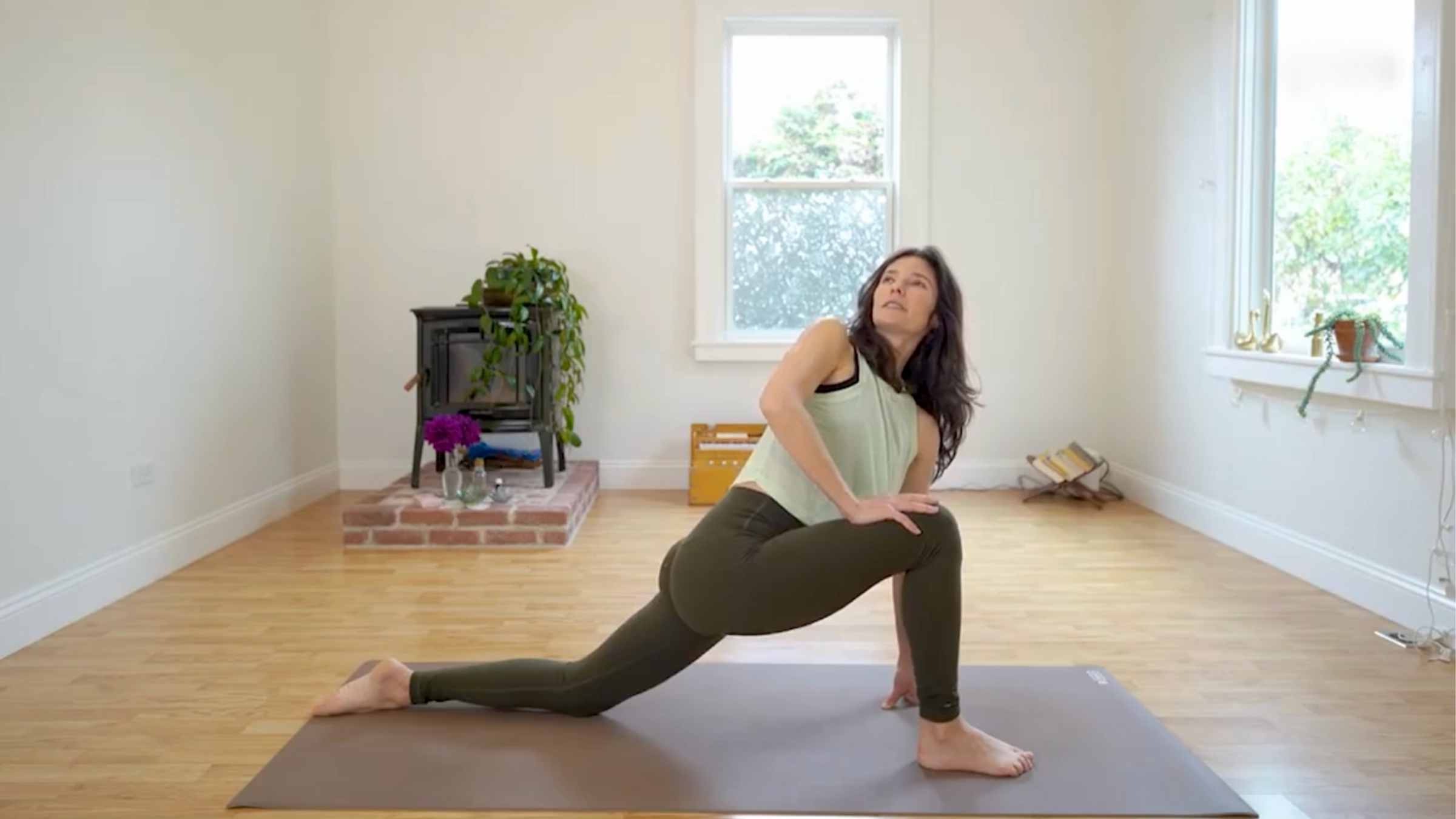 Yoga teacher Michelle Martone in Revolved Low Lunge, one of a series of hip openers