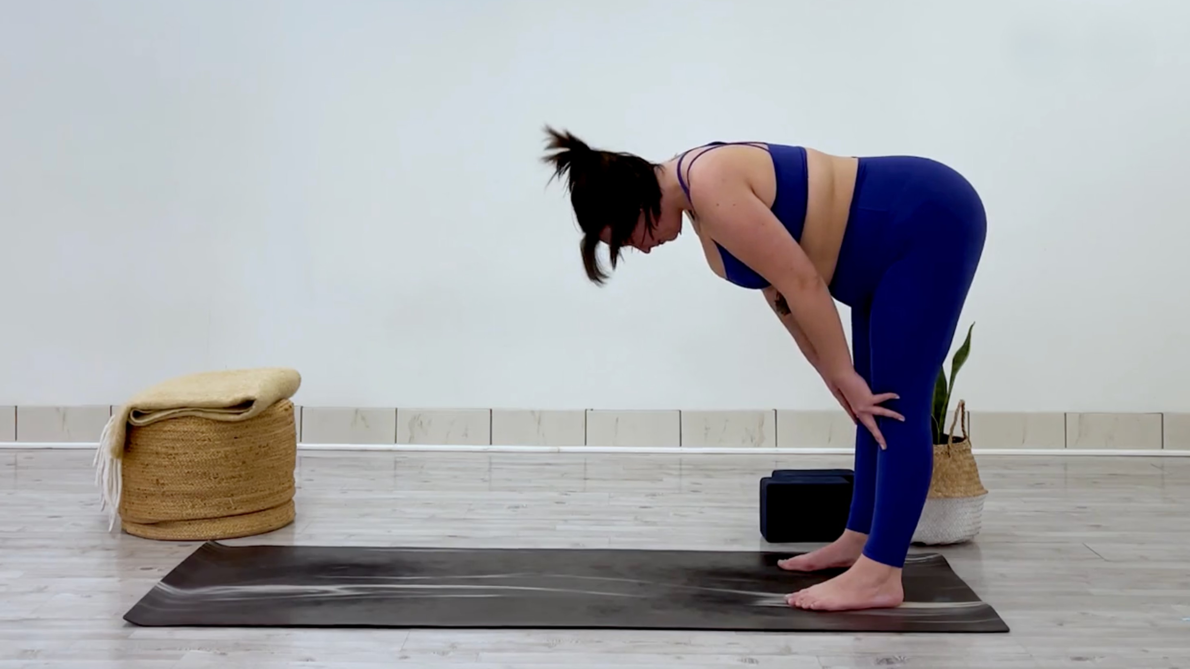Yoga teacher Taylor Lorenz's Halfway Lift, part of her yoga practice when she's feeling overstimulated