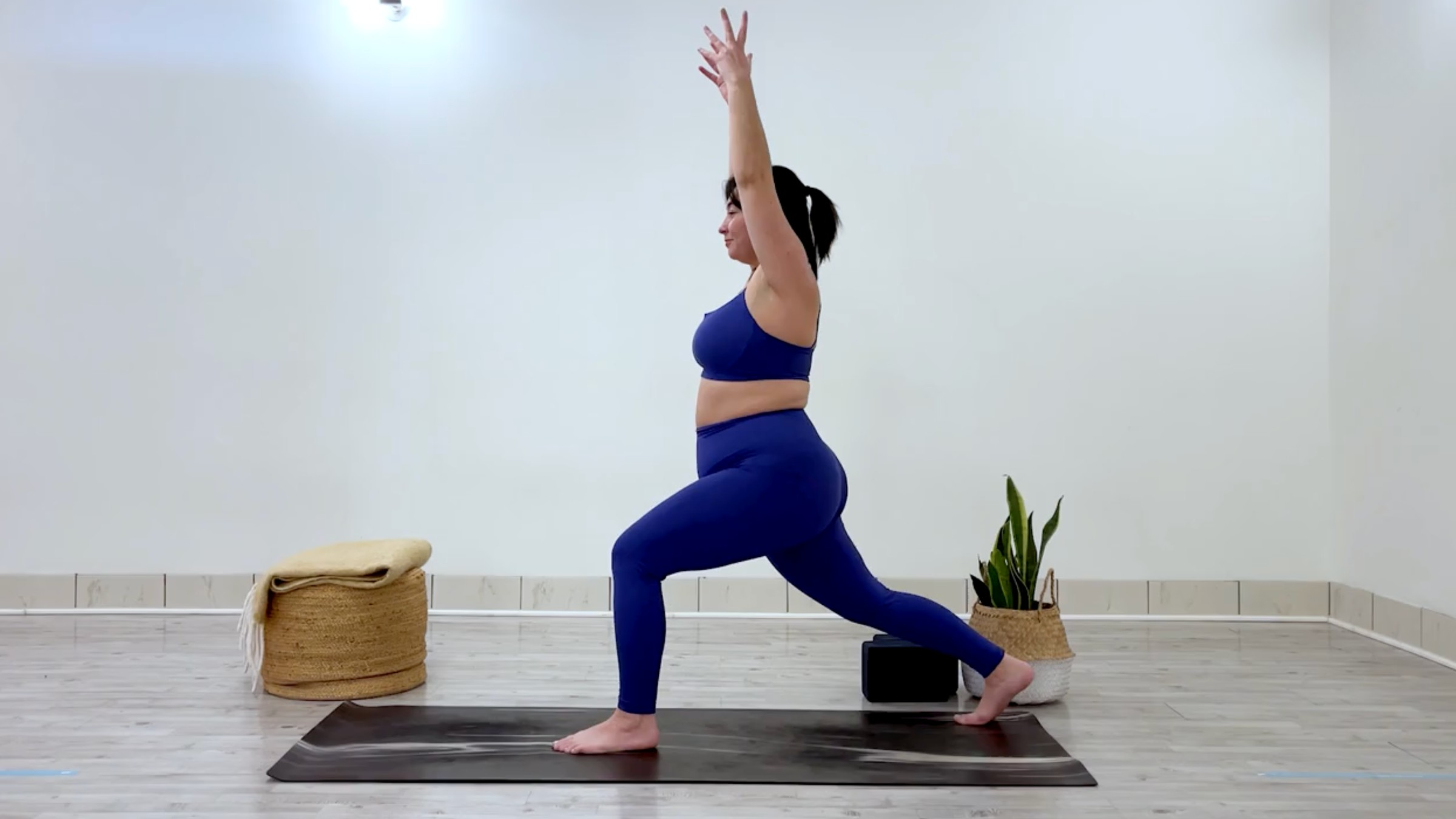 Yoga teacher Taylor Lorenz at High Crescent Lunge