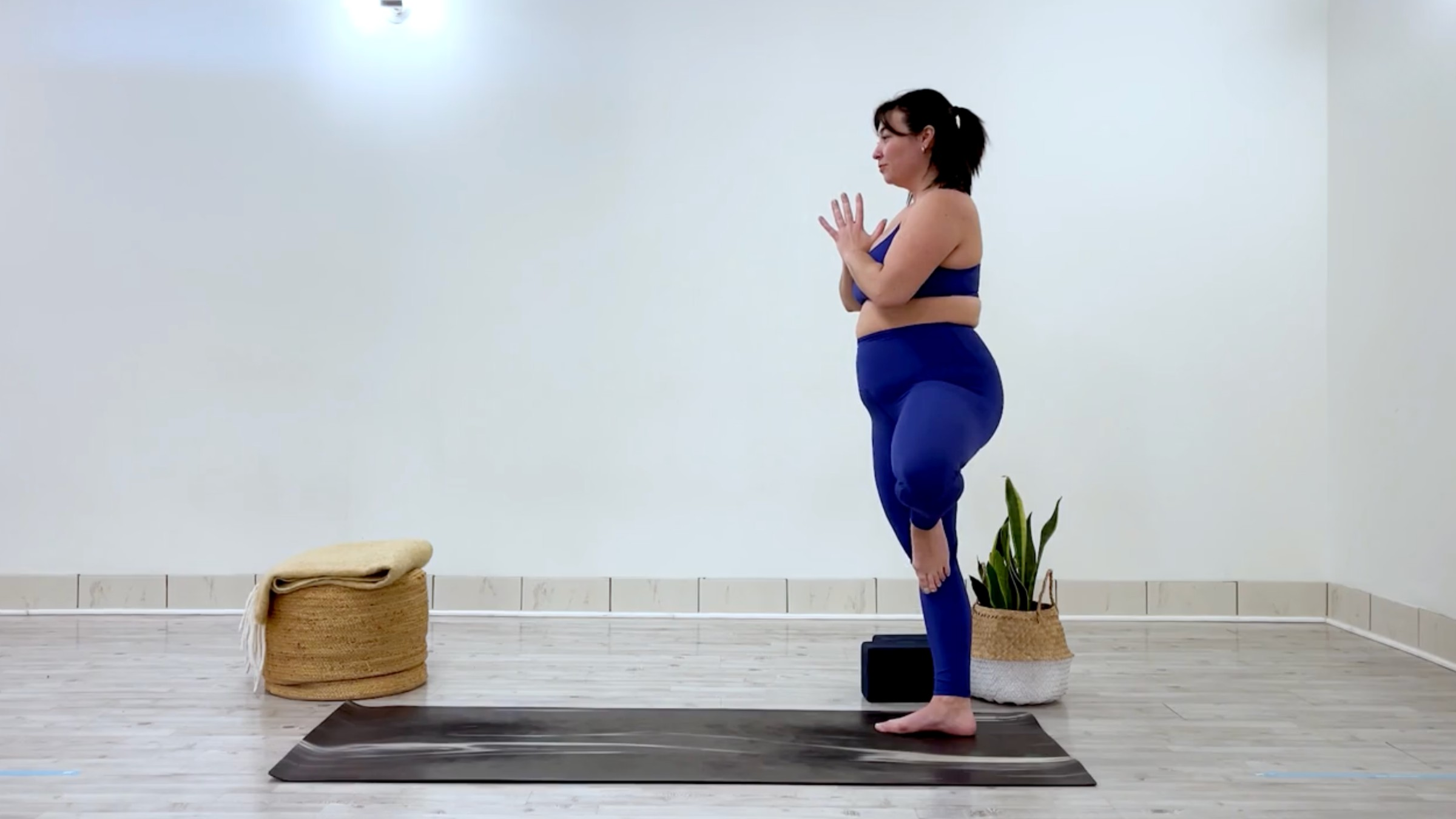 Yoga teacher Taylor Lorenz in tree pose