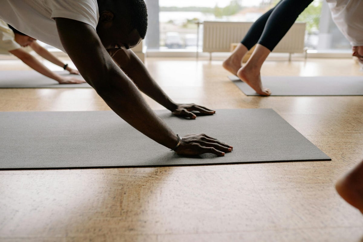4 Ways to Make Yoga Easier on Your Wrists, According to This Podcast