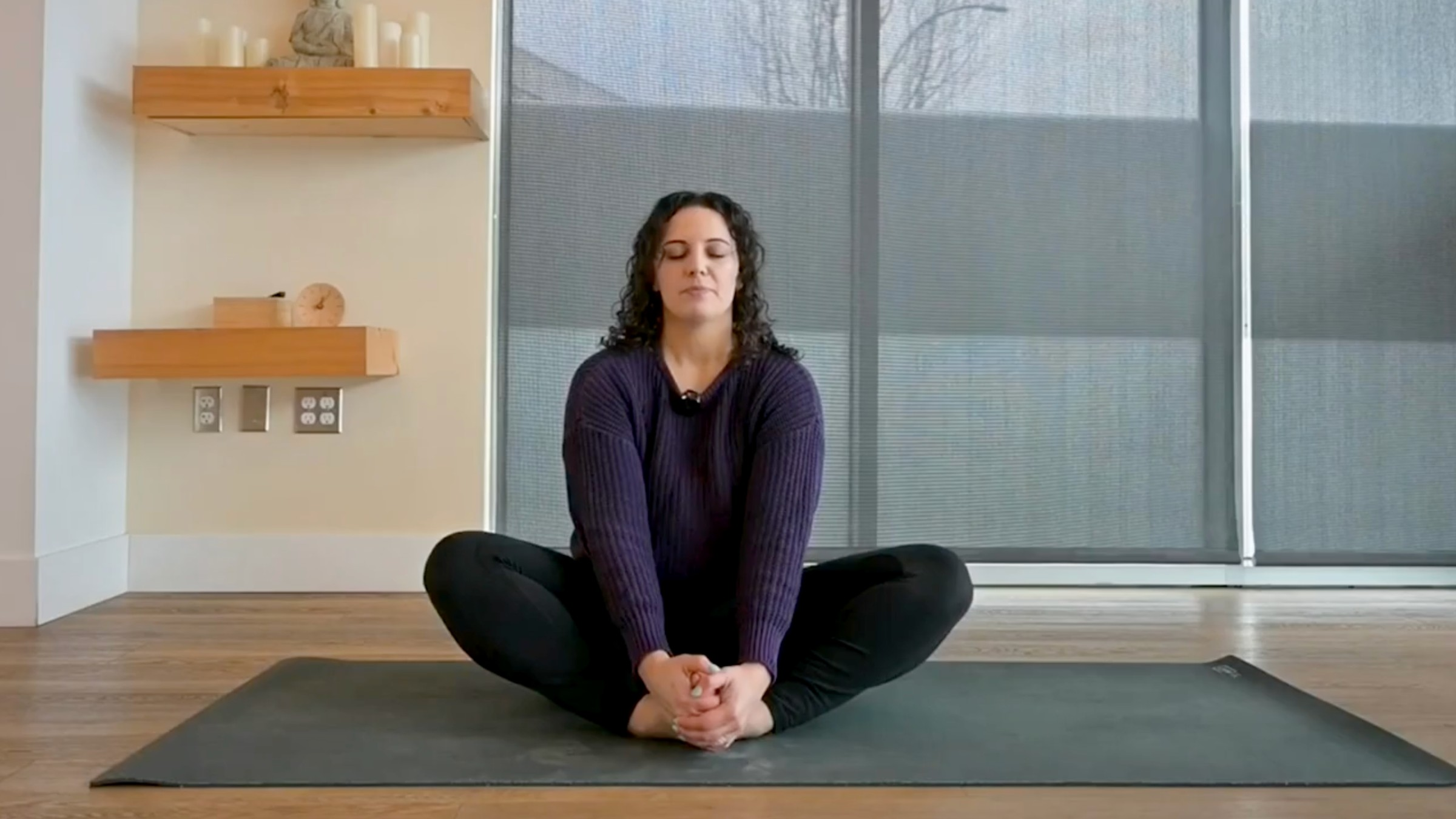Yoga teacher Taylor Lorenz in Bound Angle Pose, part of her positive affirmations yoga practice