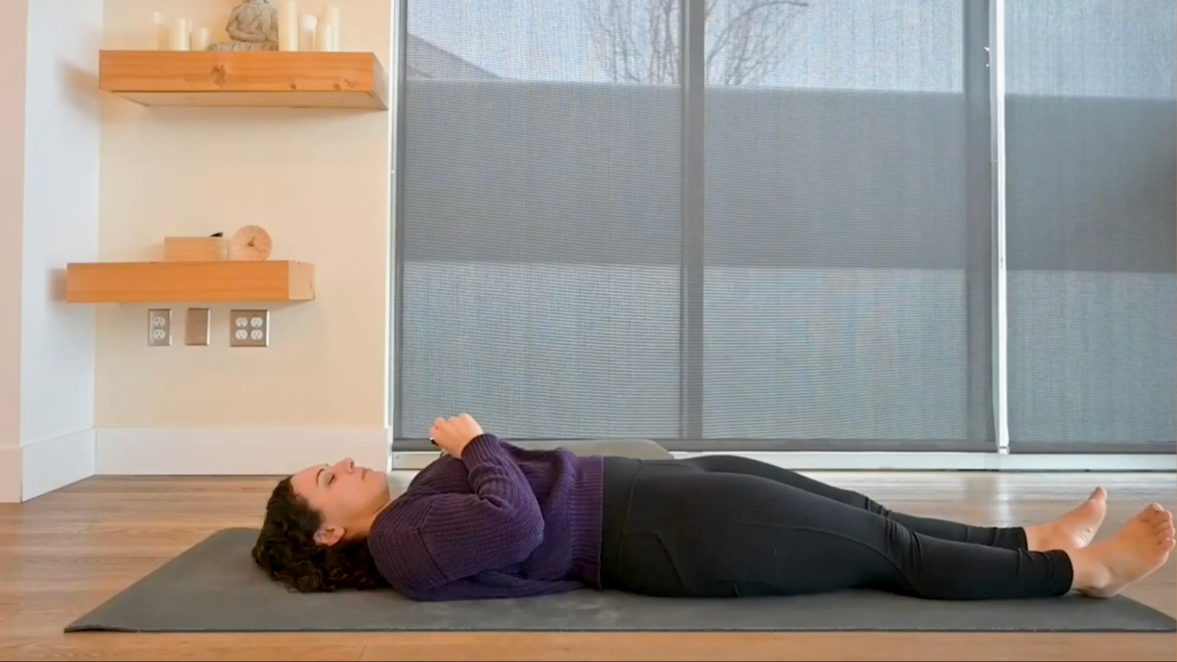 Teacher Audriana Monteiro in Savasana