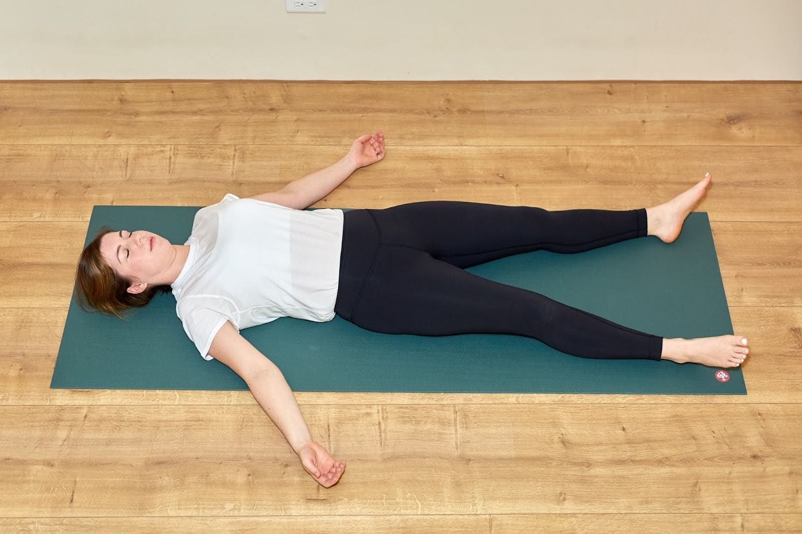 Teacher Katie McGrath in Corpse Pose