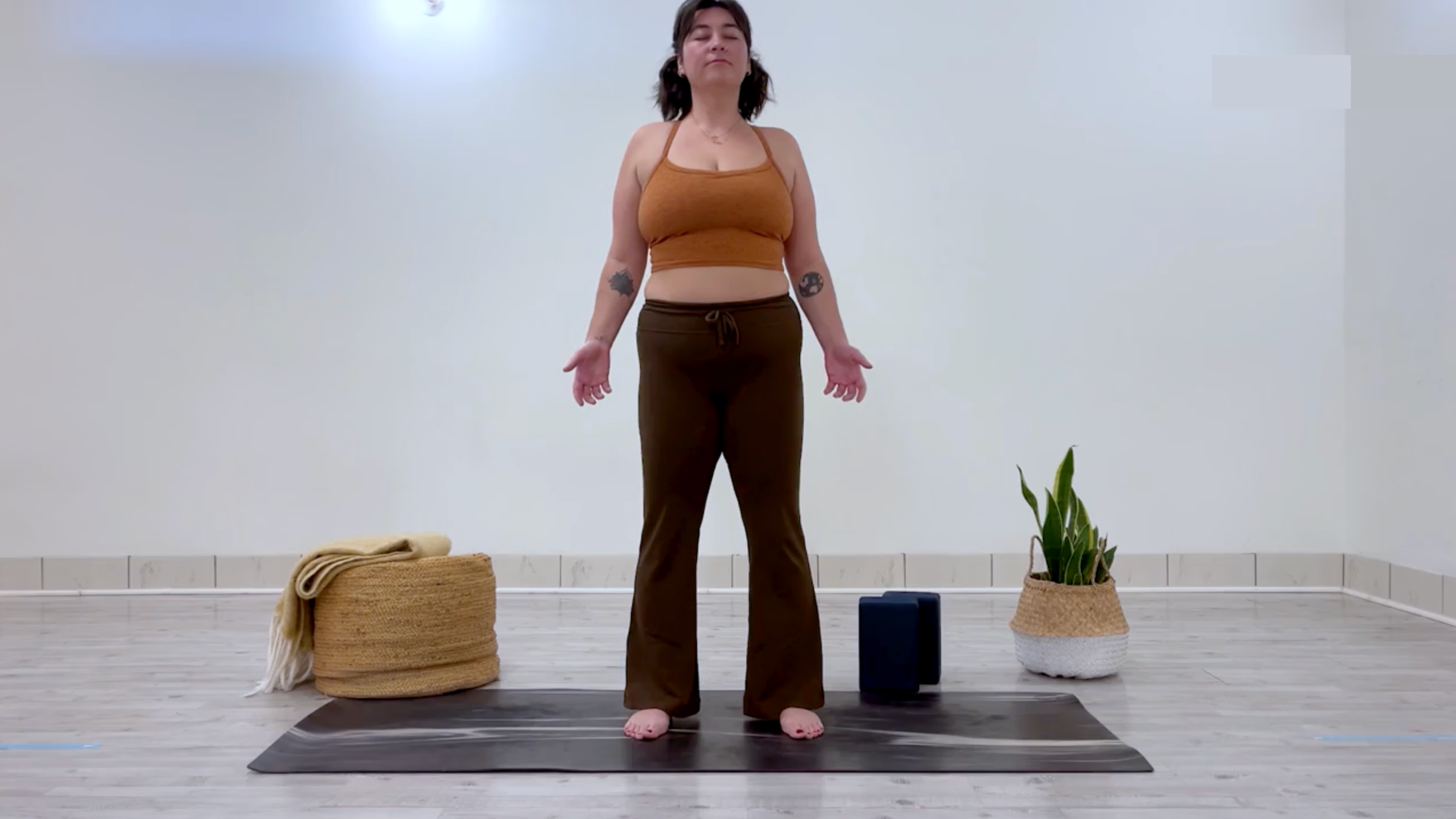 Teacher Taylor Lorenz in Mountain Pose