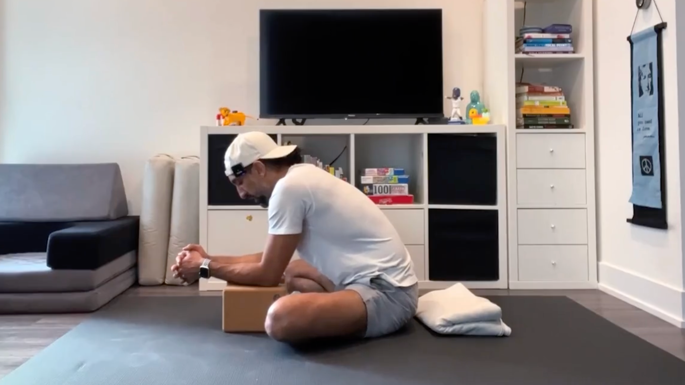 Yoga teacher Jaafar Hussain at Seated Forward Bend, part of his yoga training for the hips