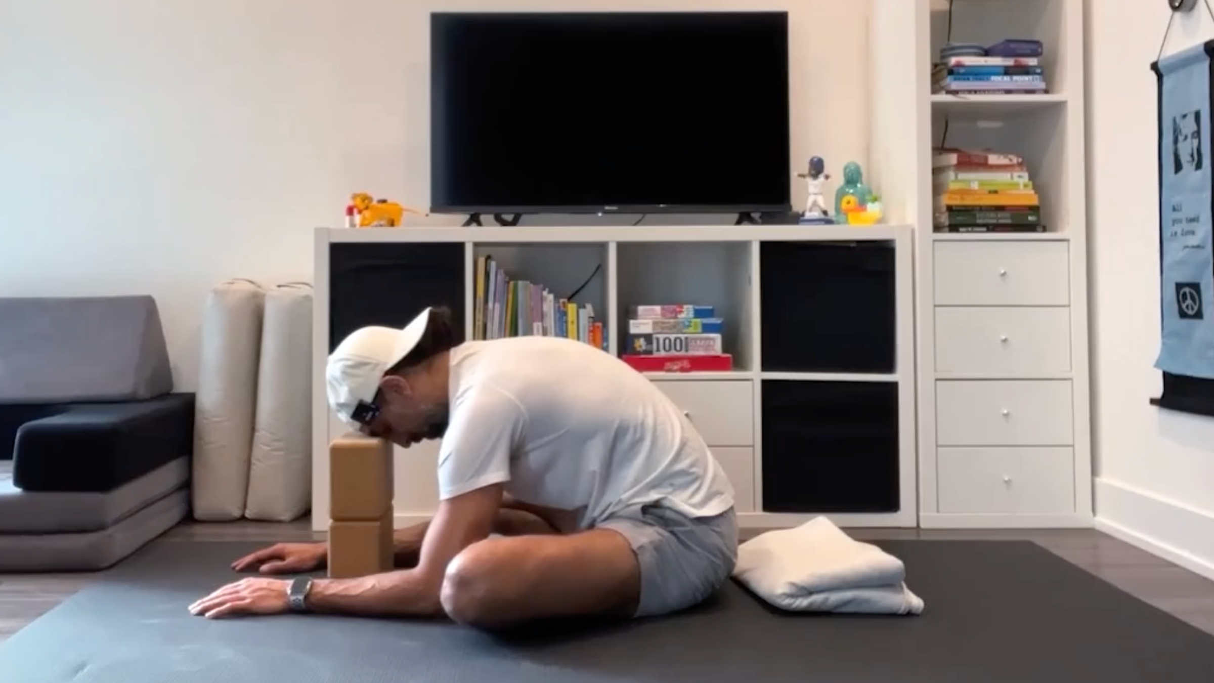 Yoga teacher Jaafar Hussain at Seated Forward Bend, part of his yoga training for the hips